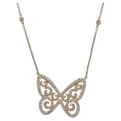 Messika, collier pendentif papillon en or jaune et diamants