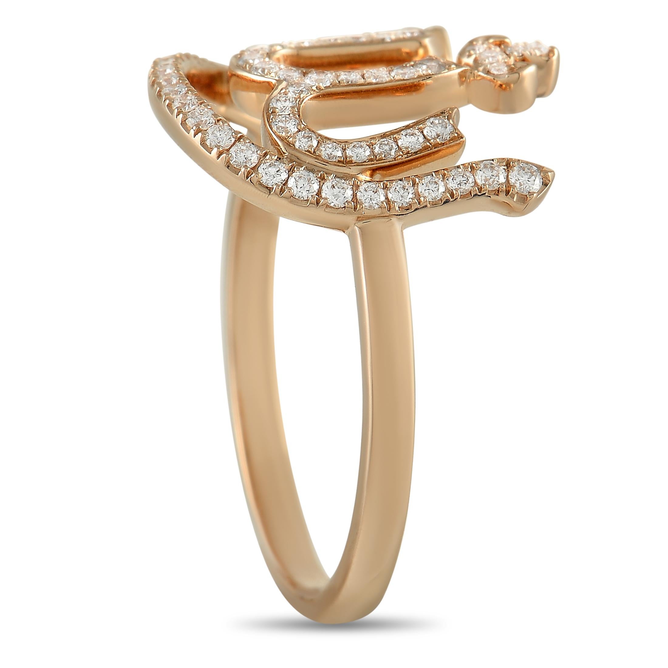 This Messika Faith Allah 18K Rose Gold 0.21 ct Diamond Ring is made with warm 18K Rose Gold, and set with 0.21 carats of beautiful small round-cut diamonds. The ring has a band thickness of 2 mm, a top height of 4 mm, and top dimensions of 20 by 15