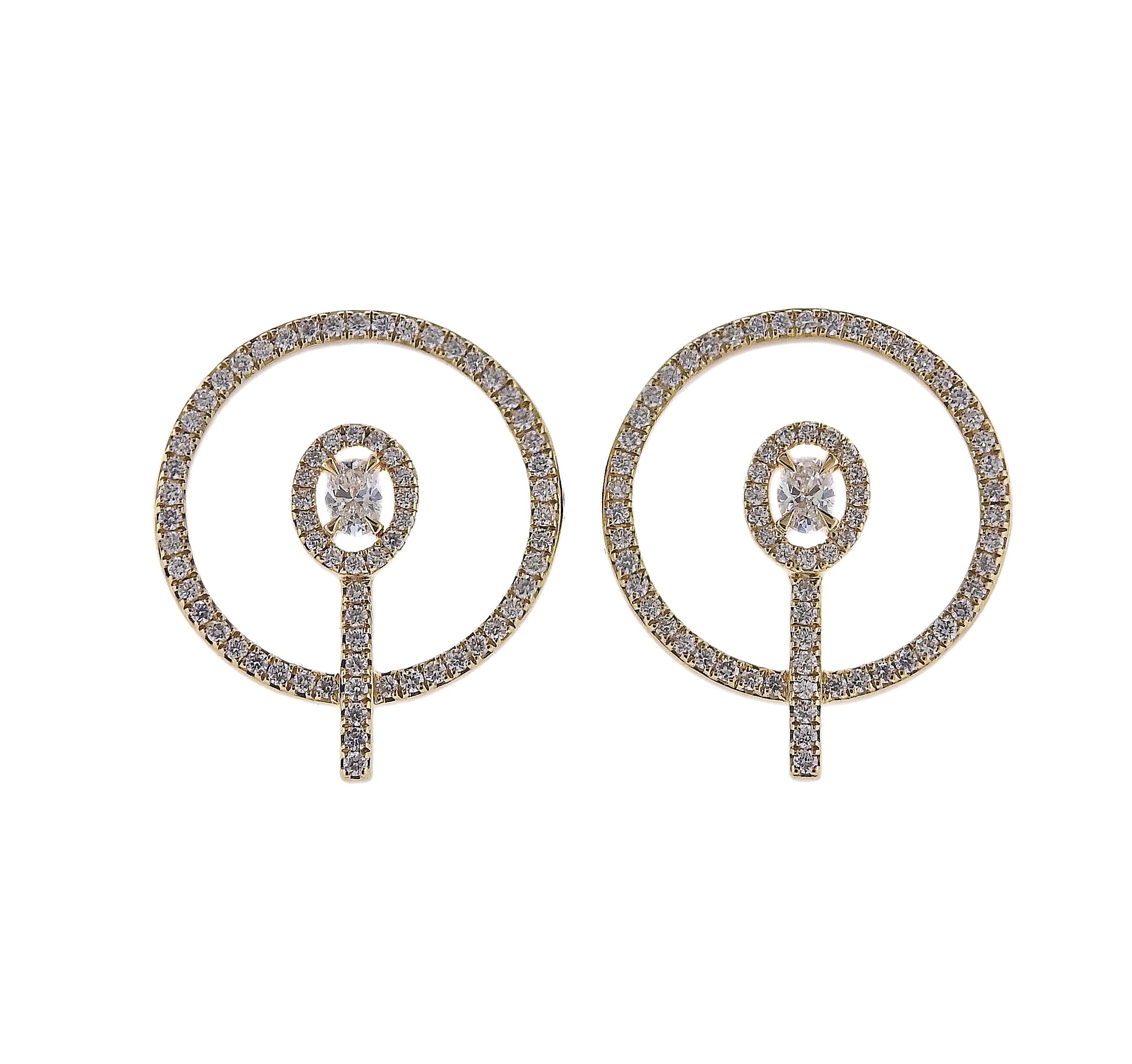 18k yellow gold Glam'Azone collection circle earrings by Messika, set with 0.84ctw G/VS diamonds. Earrings are 18mm in diameter. Marked: Messika,750, A45437. Weight is 6.8 grams. Retail Value $6,100. Store sample, box.