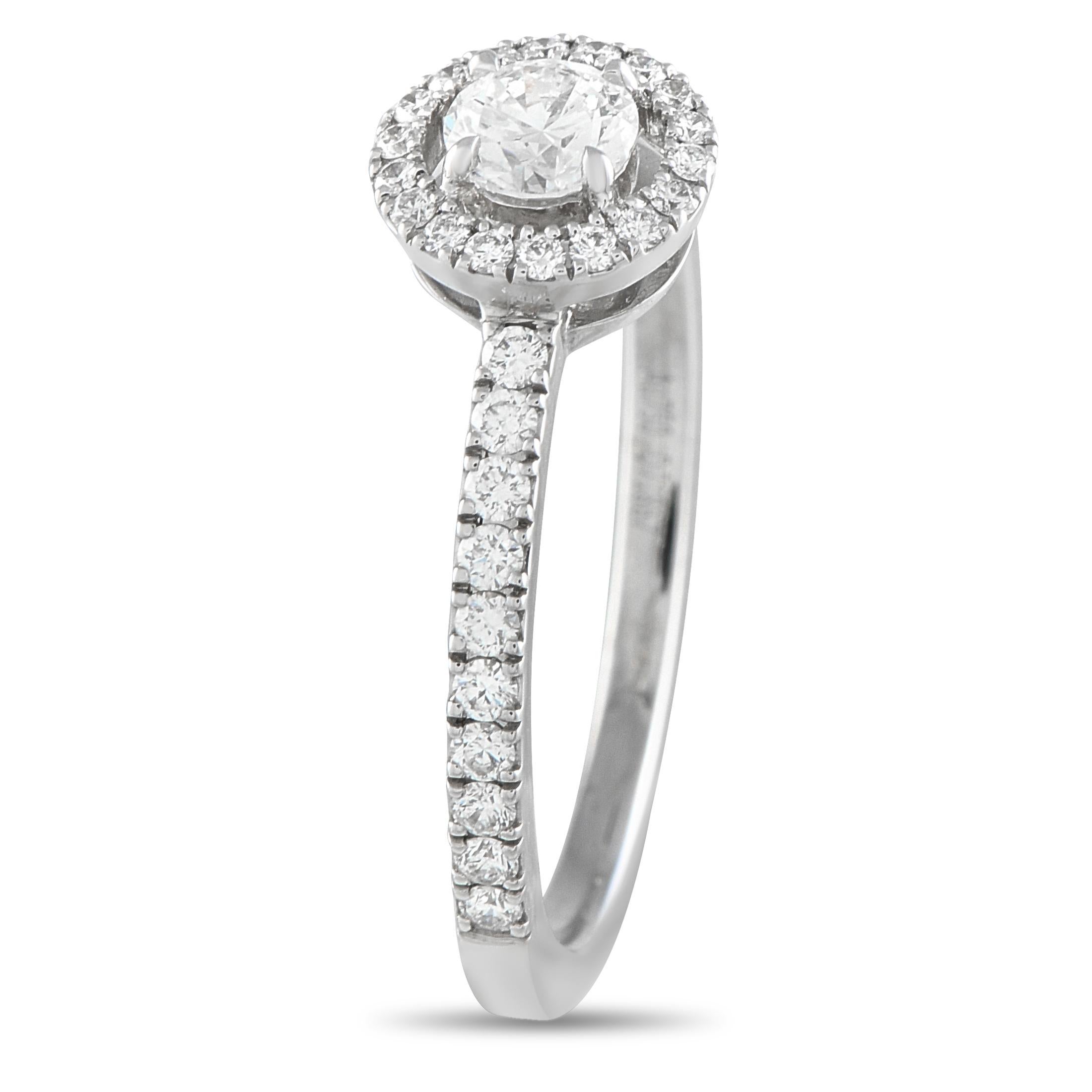 Chic and incredibly elegant, this 18K White Gold Messika Joy ring is poised to serve as a stunning symbol of your love. This exquisite design comes to life thanks to sparkling Diamonds that together possess a total weight of 0.50 carats. Made with a