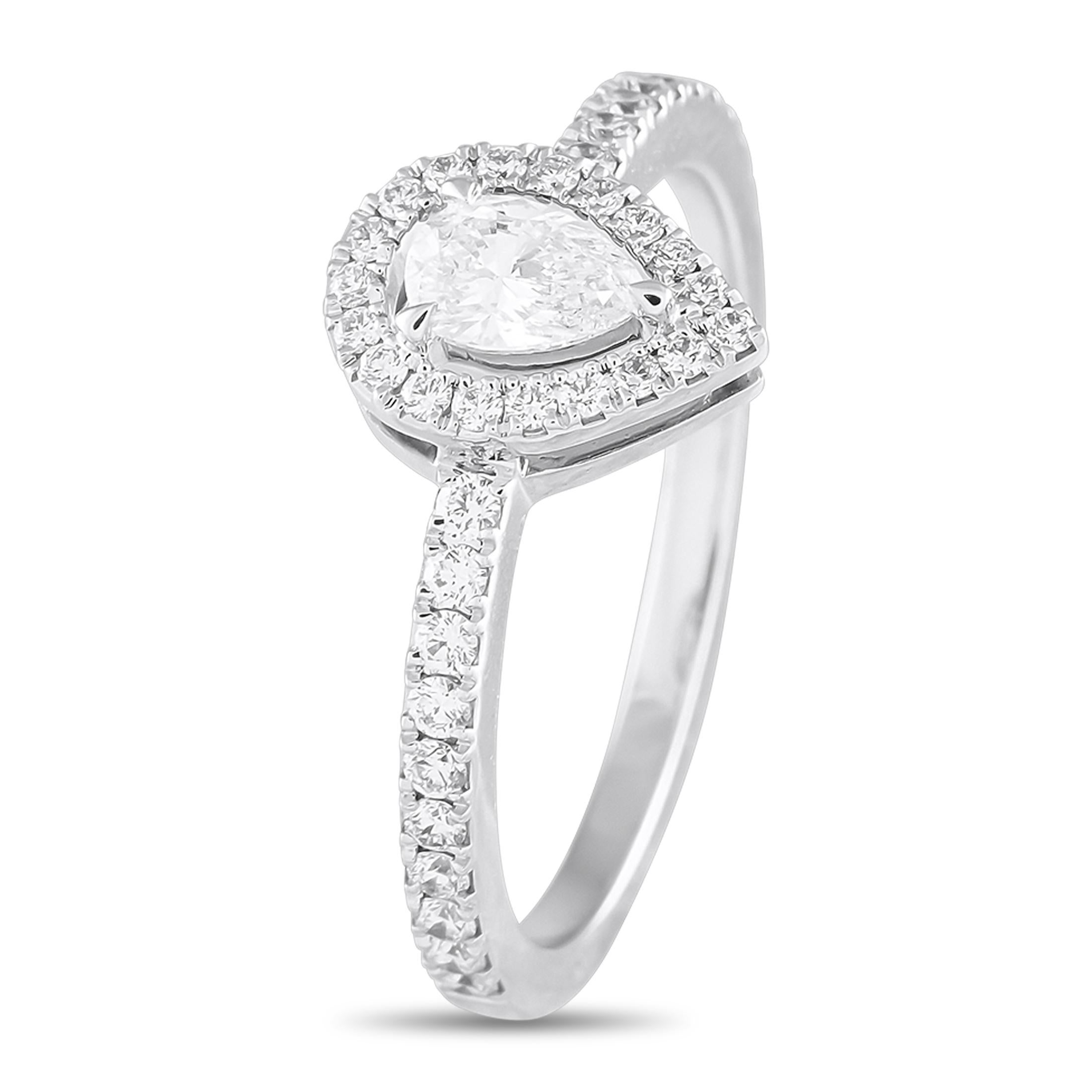 This Messika Joy ring is incredibly elegant. Crafted from 18K White Gold, the simple setting comes to life thanks to sparkling Diamonds totaling 0.50 carats. This piece features a 2mm wide band and a 6mm top height, making it the perfect piece for