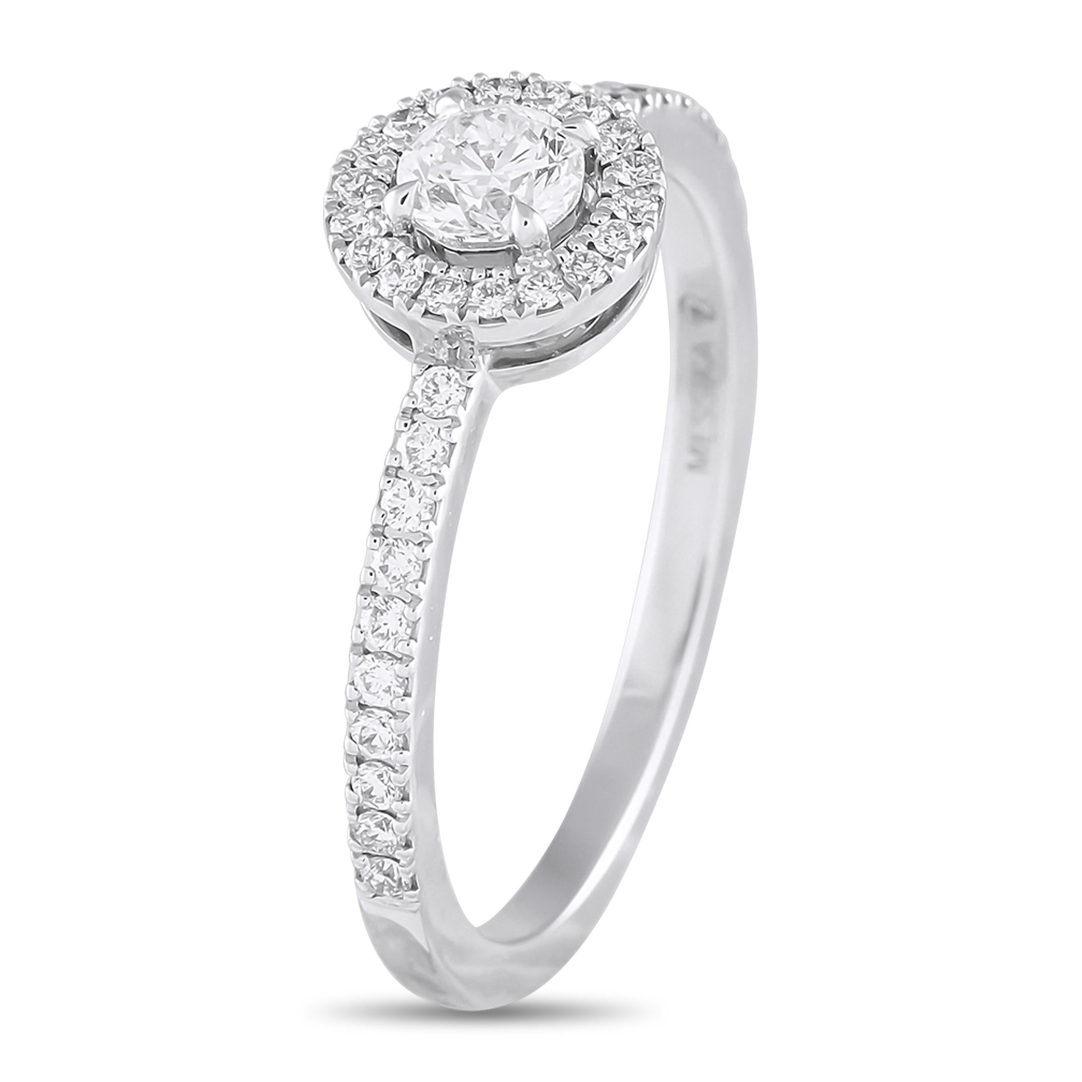 This Messika Joy ring will always make a subtle statement. A simple 18K White Gold setting beautifully showcases the elegant array of sparkling Diamonds totaling 0.50 carats. Incredibly timeless in design, it features a 2mm wide band and a 7mm top