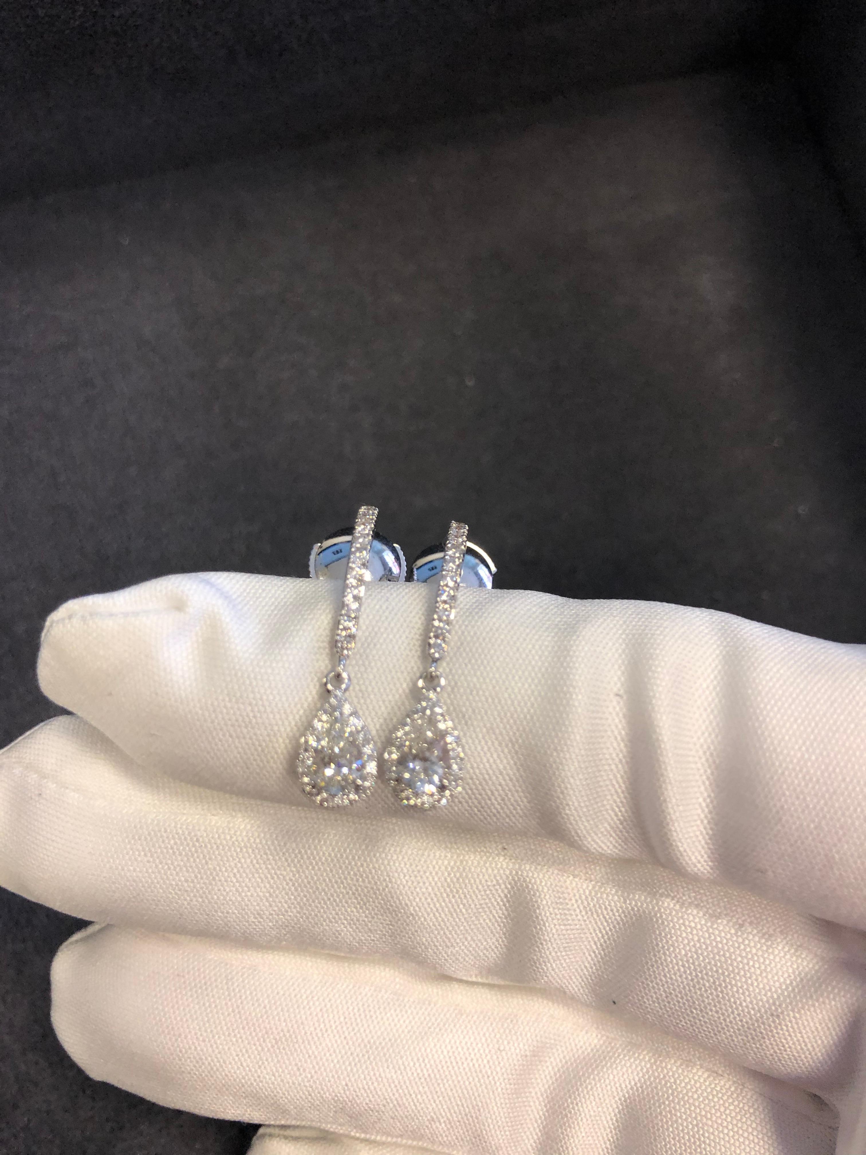 Messika Joy Sleeper Diamond Drop Earrings in 18 Karat White Gold, this pair of beautiful hand-crafted earrings by Maison Messika made in 18 Karat White Gold and set with pear shaped diamonds weighing 0.51cts, this delicate pair of earrings can be