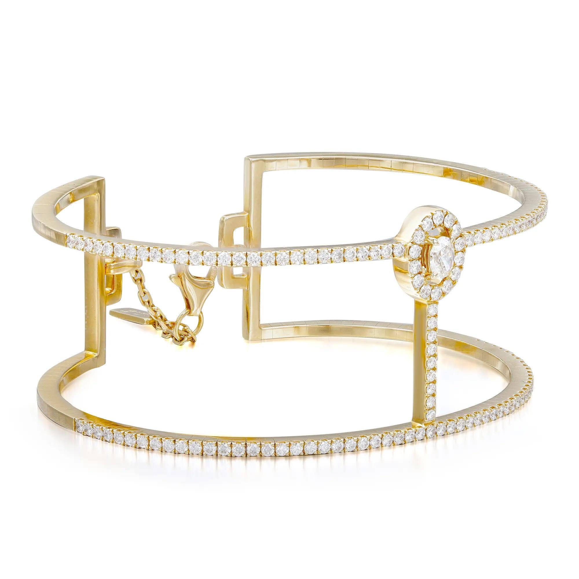 Walk with grace with this gorgeous Messika Manch Glam'Azone diamond 2 rows cuff bracelet. Crafted in lustrous 18K yellow gold. It features center prong set oval cut diamond accented with round brilliant cut diamonds halfway through the bracelet.