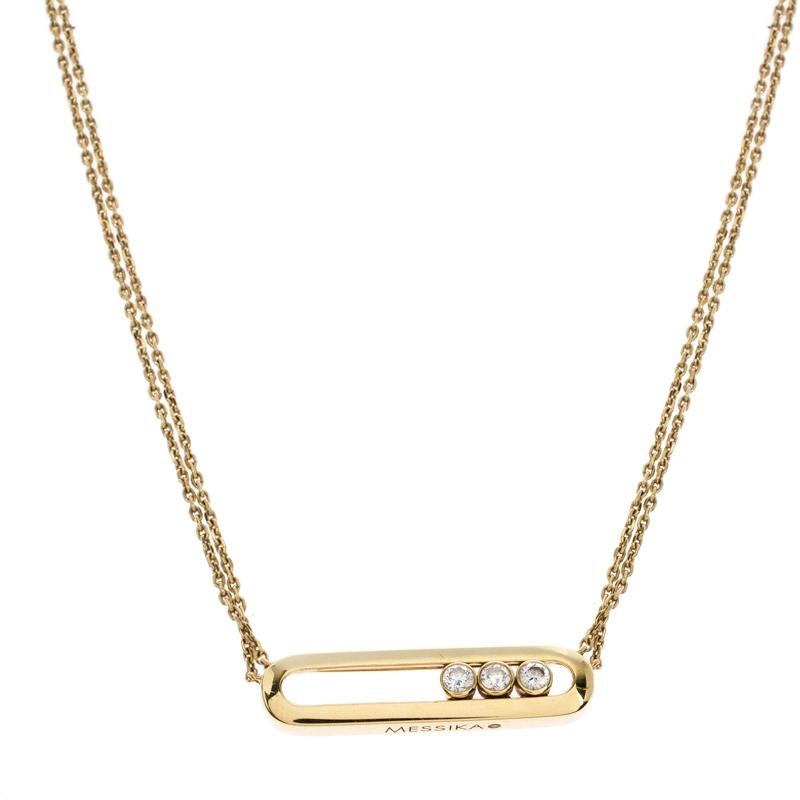 The Move is an iconic collection of house Messika, a line that embodies love and romance through three moving diamonds set in simple designs. This beautiful necklace is fully handcrafted from 18k yellow gold into a minimal yet timeless silhouette