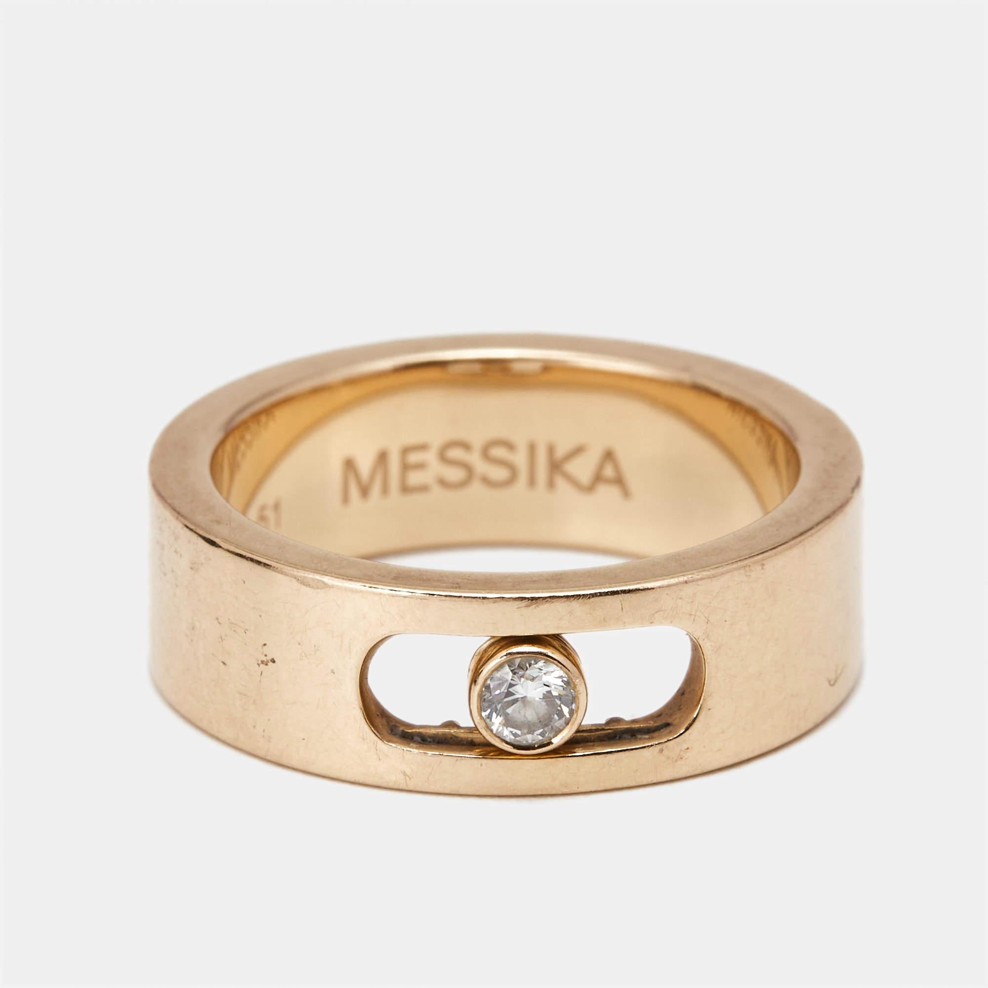 Crafted from 18k rose gold the Messika Move Joaillerie wedding ring features three stunning diamonds that move gracefully within the band symbolizing loves past present and future. With its sleek and modern design this luxurious ring exudes timeless