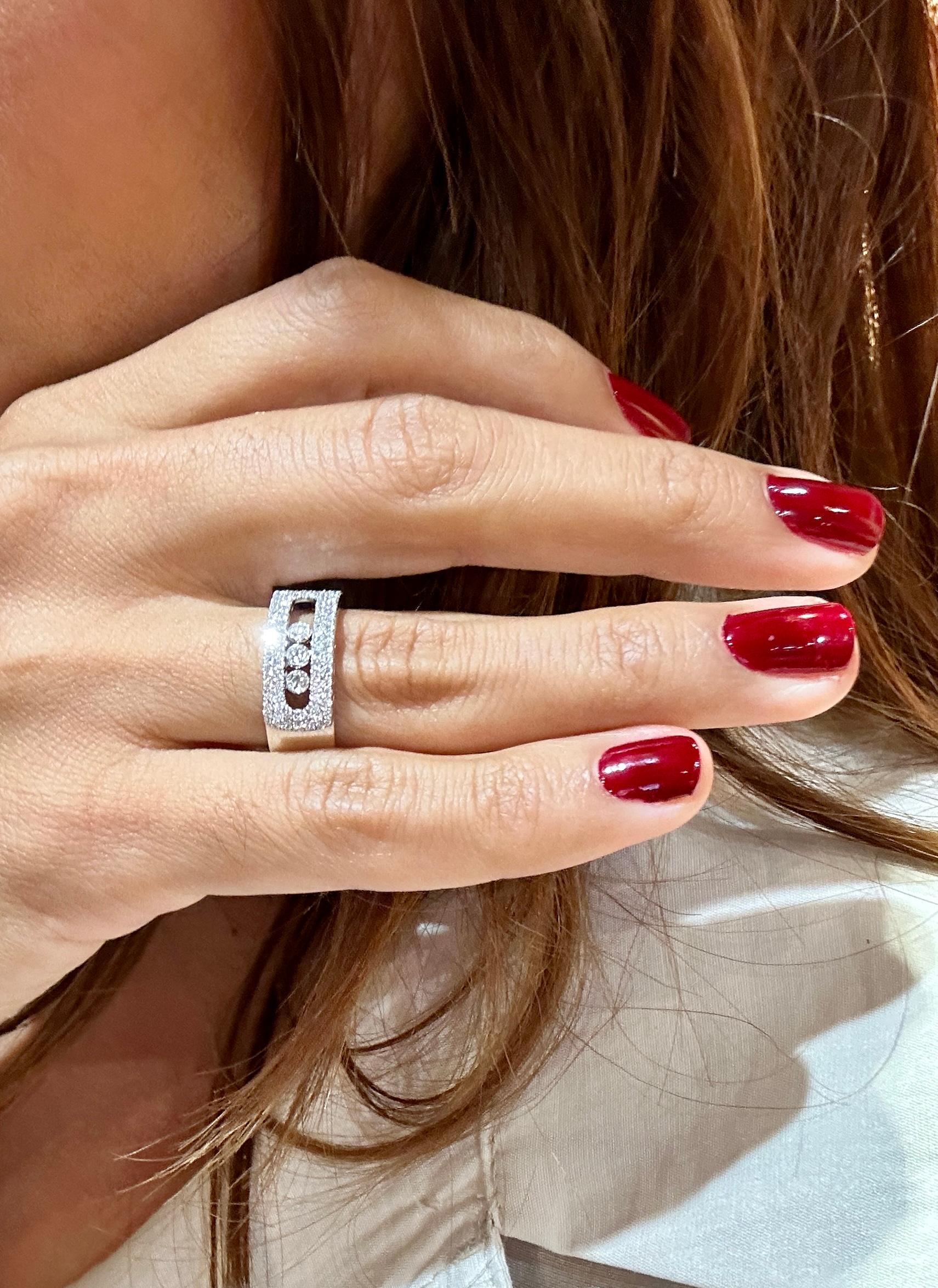 Messika Move Noa large pavé-set diamond ring in 18k White Gold. A Luxury ring that is perfect for both everyday wear and special occasions. 
The three diamonds roll in their opened cage and are enhanced by the surrounding pavé. Symbols of past,
