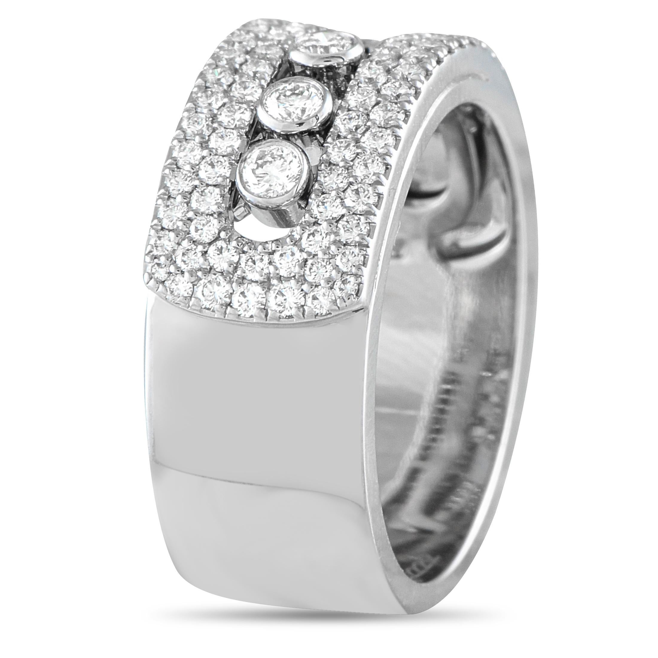 Wrap your finger with non-stop glitter with this Messika Move Noa ring. It features a wide band in polished 18K white gold, adorned with a track for three moving diamonds. Enhancing the sparkle of the diamonds in motion is a diamond-paved top