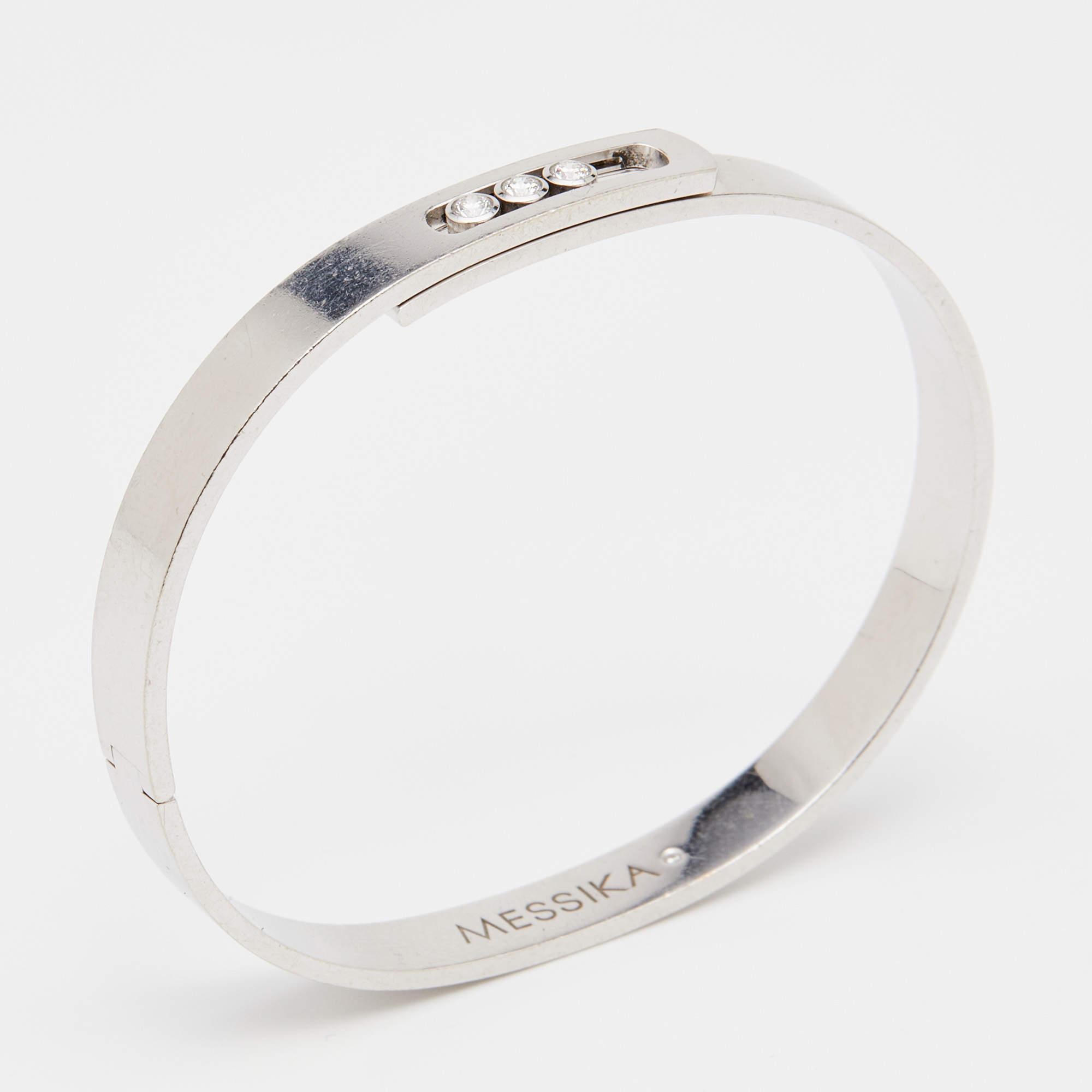 Move is an iconic collection of house Messika, a line that embodies love and romance through three moving diamonds set in simple designs. This beautiful bracelet is crafted from 18k white gold into a minimal yet timeless silhouette exuding modern