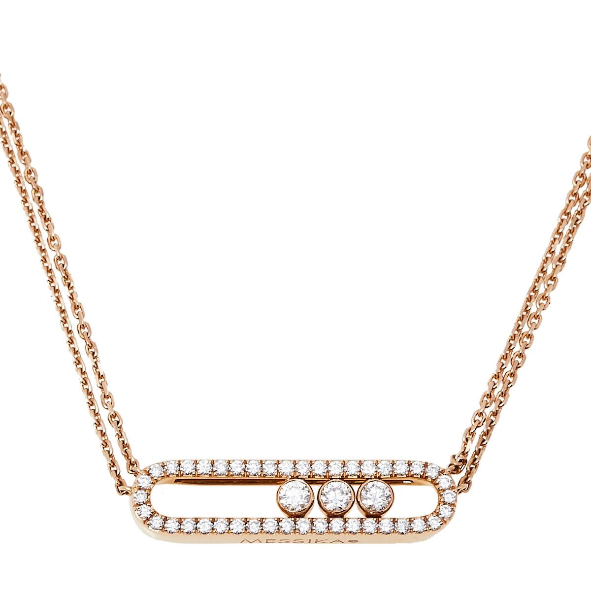 The Move is an iconic collection of house Messika, a line that embodies love and romance through three moving diamonds set in simple designs. This beautiful double chain necklace is fully sculpted from 18k rose gold into a minimal yet timeless