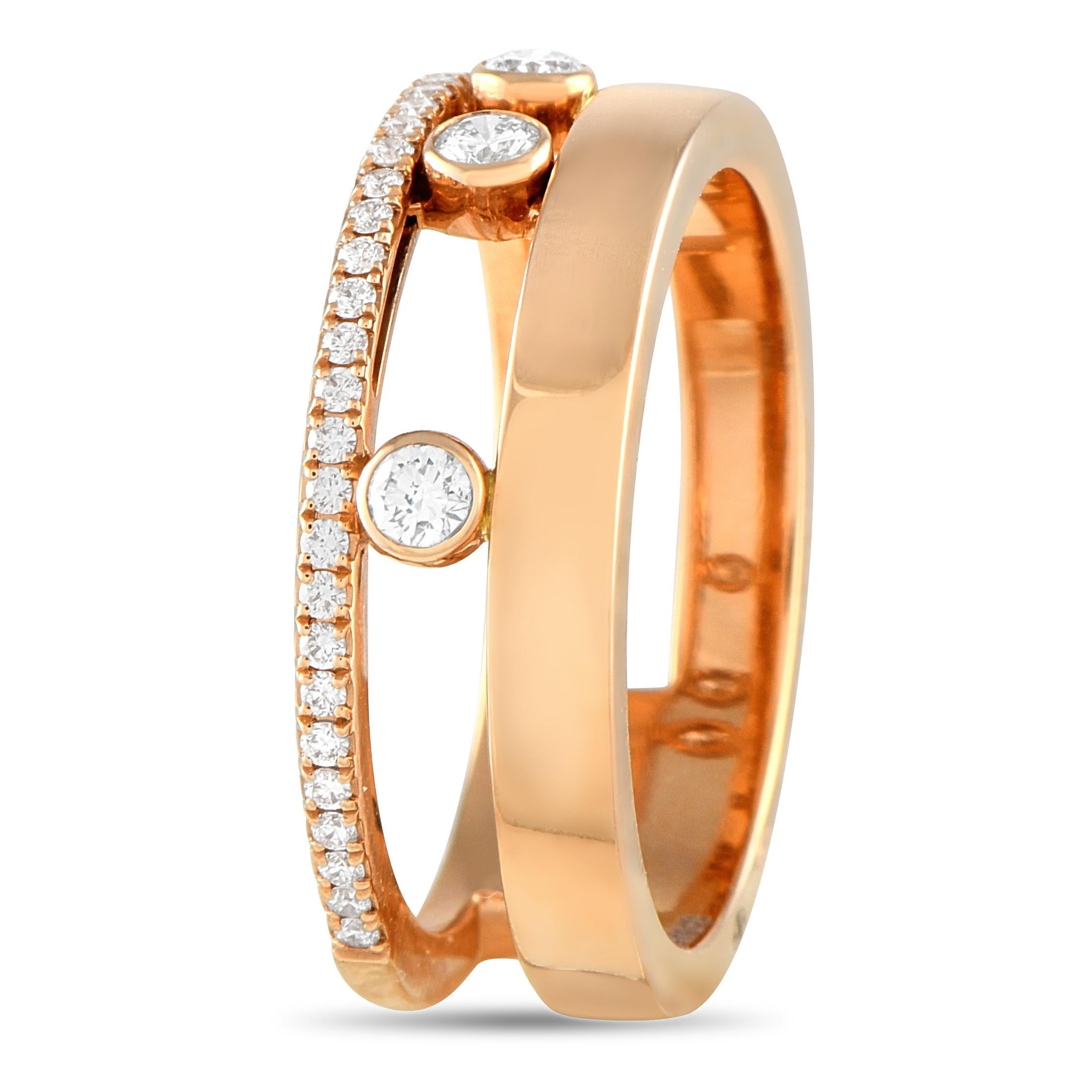 Like all pieces from the Messika Move Romaine collection, this ring features clean lines and stylish asymmetry. A thin band of Diamonds is elegantly offset by a thicker 18K Rose Gold band, while a trio of Diamonds suspended at the center accompany