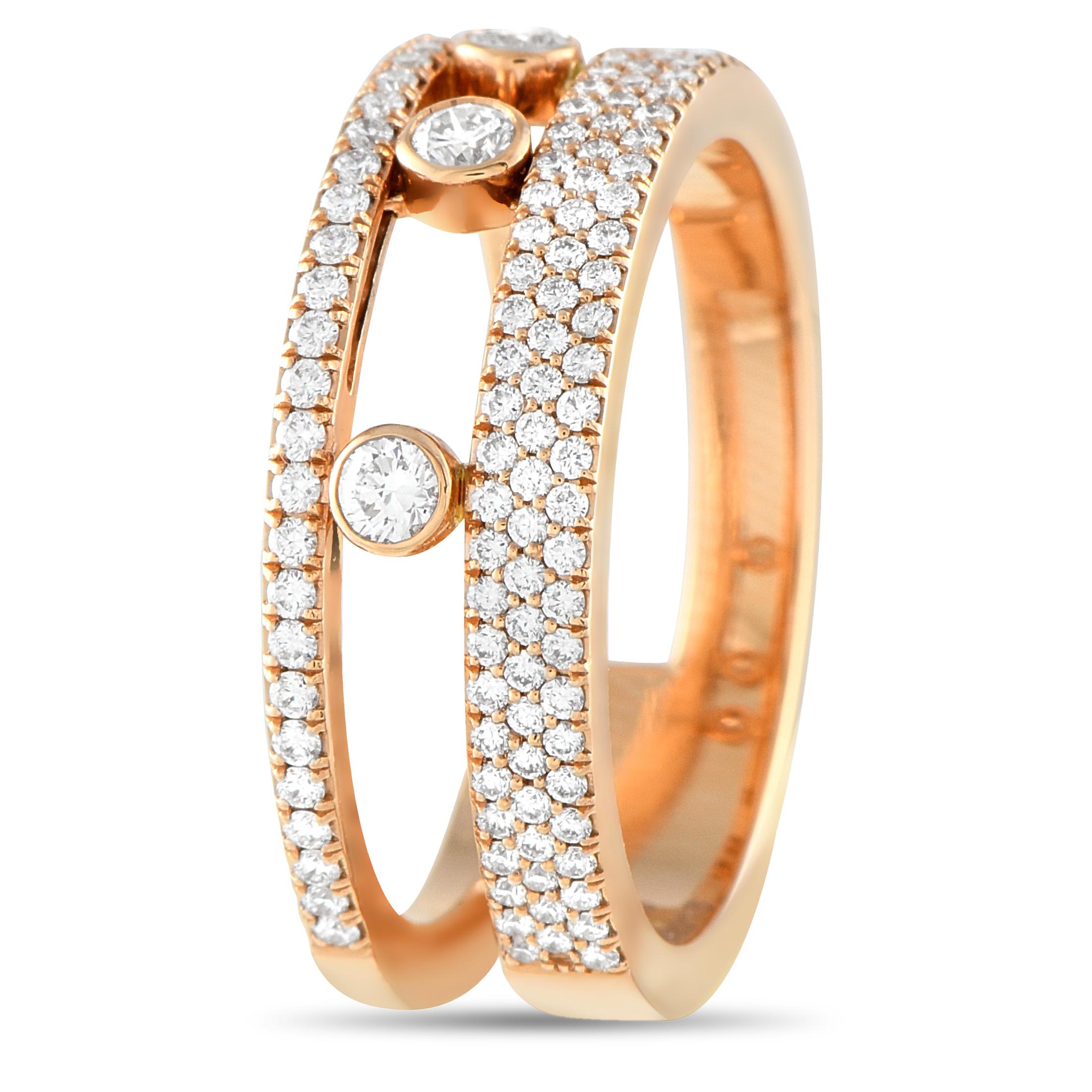 This Messika Move Romaine ring offers both elegant asymmetry and a delightful sense of movement. On this piece, a trio of Diamonds seemingly float at the center of the stylish, graphic design. Complete with Diamonds totaling 0.65 carats, this ring