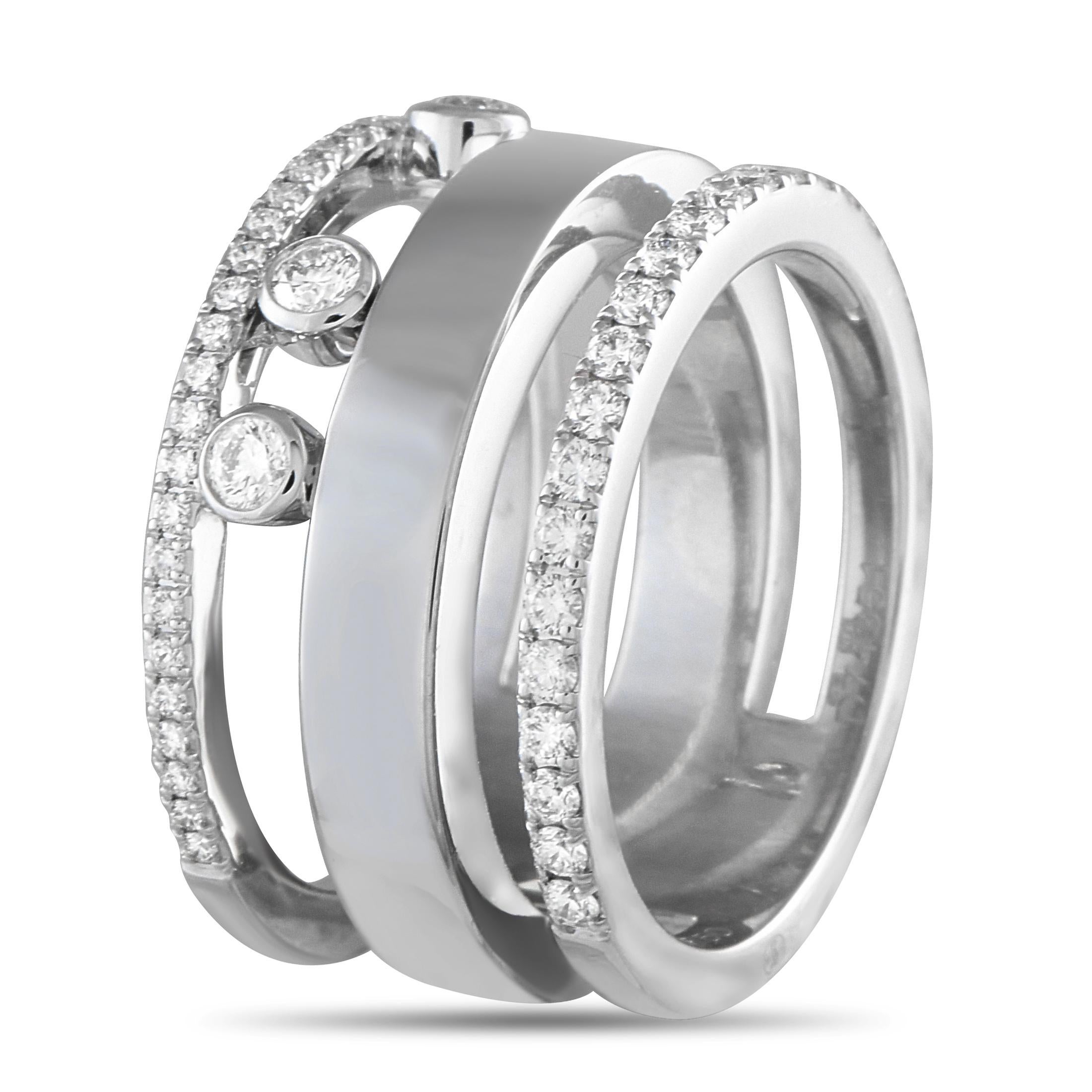 Lovers of the unexpected and unusual will appreciate the unique look of this large Move Romane ring by Messika. This white gold piece features three bands in a floating-stack look. Two of the three bands have a slender profile, detailed with