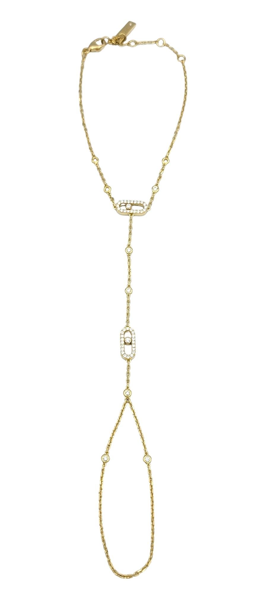 Embrace the epitome of elegance and modern luxury with this captivating hand bracelet, a design that fuses the beauty of fine jewelry with the art of adornment. Crafted entirely in radiant 18 karat yellow gold, this piece is a striking statement of