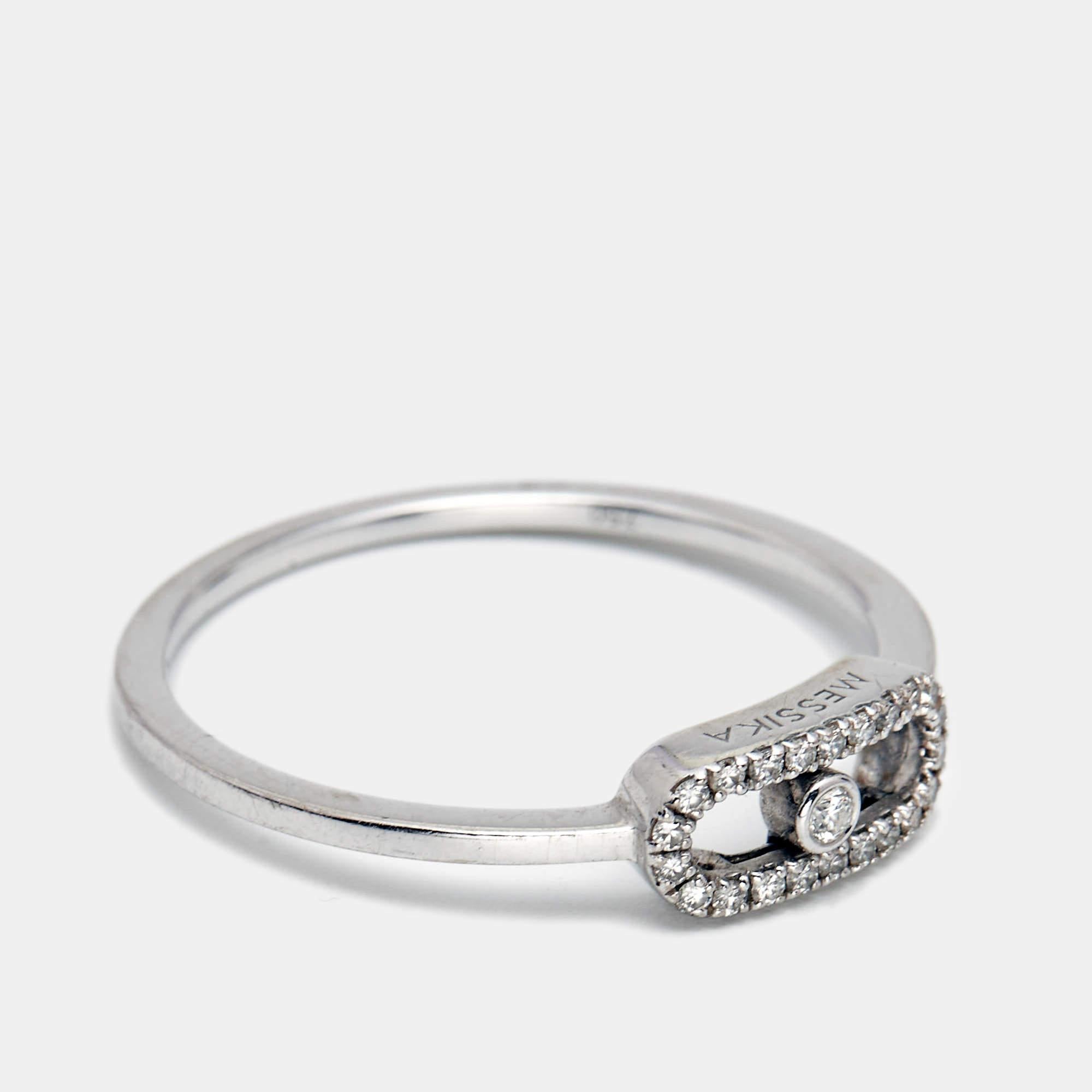 The Move collection has designs that are both wearable and timeless. This wondrous thing of beauty is handmade from 18k white gold with a slender band that holds a feminine diamond-encrusted cage. Within the motif, a single diamond is trapped, and