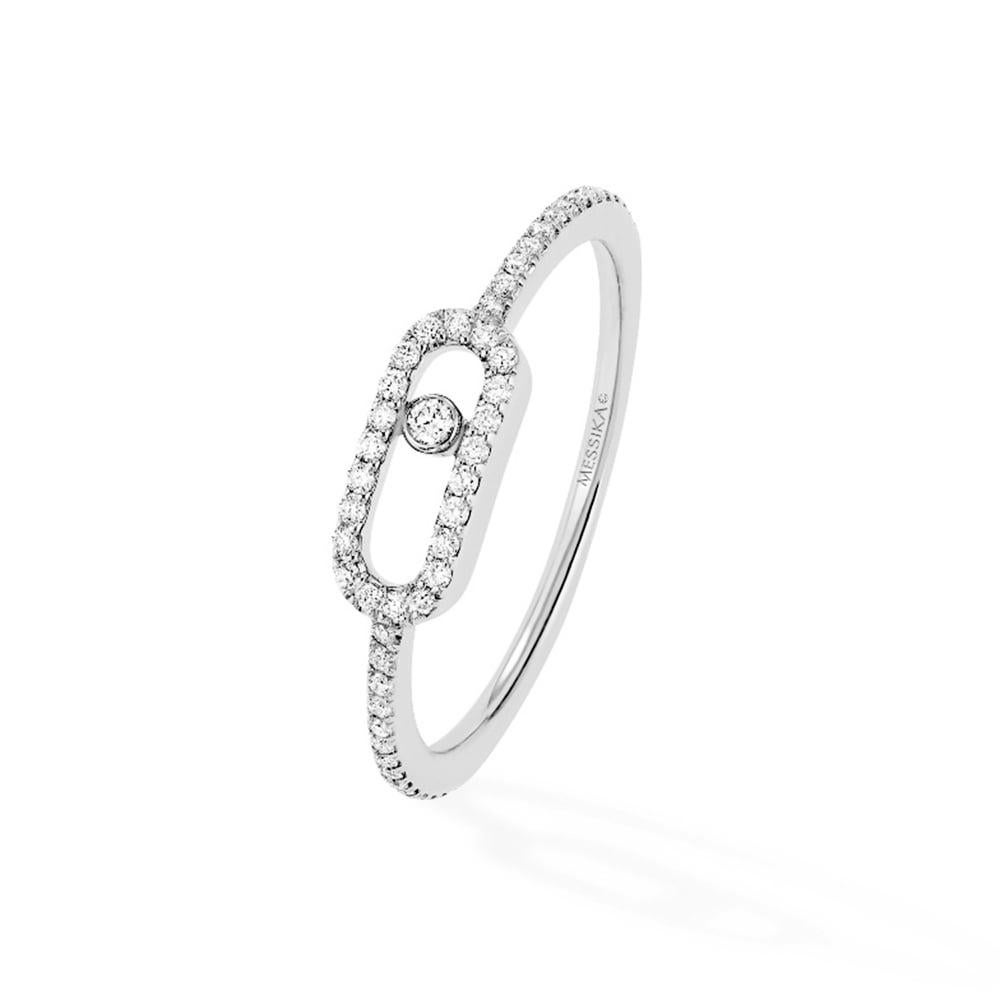 This beautiful Move Uno Ring in 18K White Gold set with pavé diamonds is hand crafted featuring a pavé bar holding a brilliant cut diamond in montion. This iconic Messika ring is set with a further brilliant cut diamonds weighing 0.17cts
Signed,