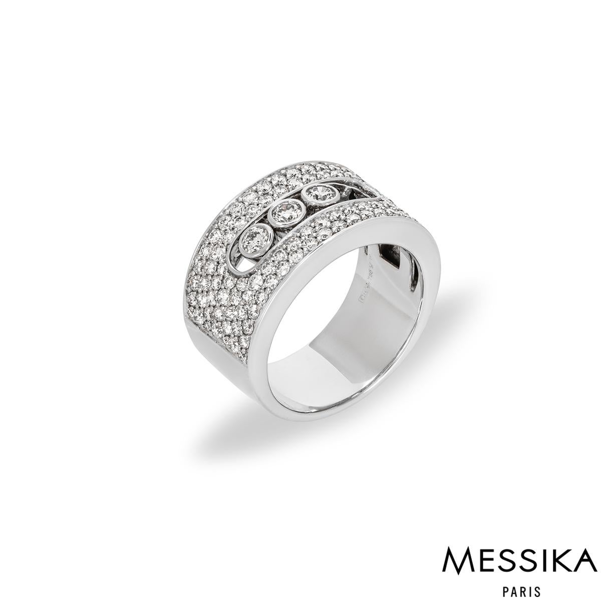 An elegant 18k white gold diamond ring by Messika from the Move Noa collection. The ring is set to the centre with 3 freely moving bezel set round brilliant cut diamonds and further complemented with 108 round brilliant cut diamonds pave set