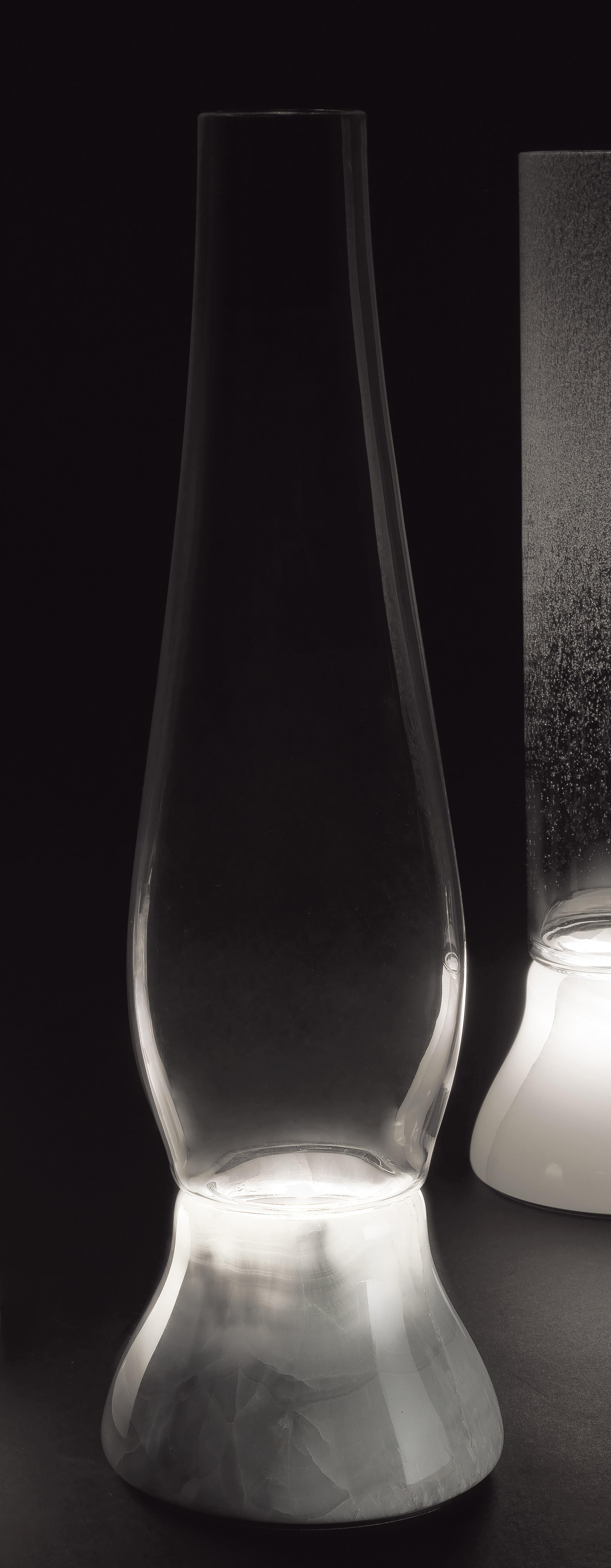 Meta Table Lamp by Kreoo 
Designed by Enzo Berti
Dimensions: Ø 15 x H 50 cm.
Materials: Light Sky onyx and Grey gradient glass.

Available in different onyx, and glass options. Please contact us.

All our lamps can be wired according to each