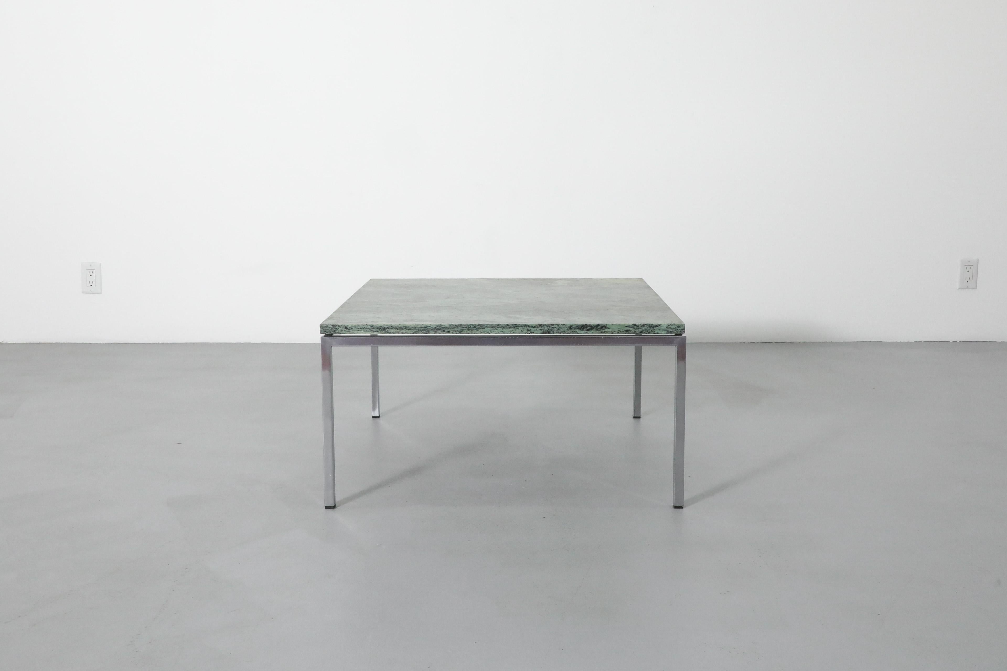 Dutch Mid-Century coffee table with a green marble top on chrome frame. Manufactured by Dutch company Metaform in the 1960's. The beautifully patterned square marble top with rich shades of green and slivers of white makes this an eye catching