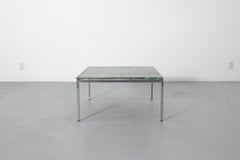 Metaform chrome coffee table with green marble top