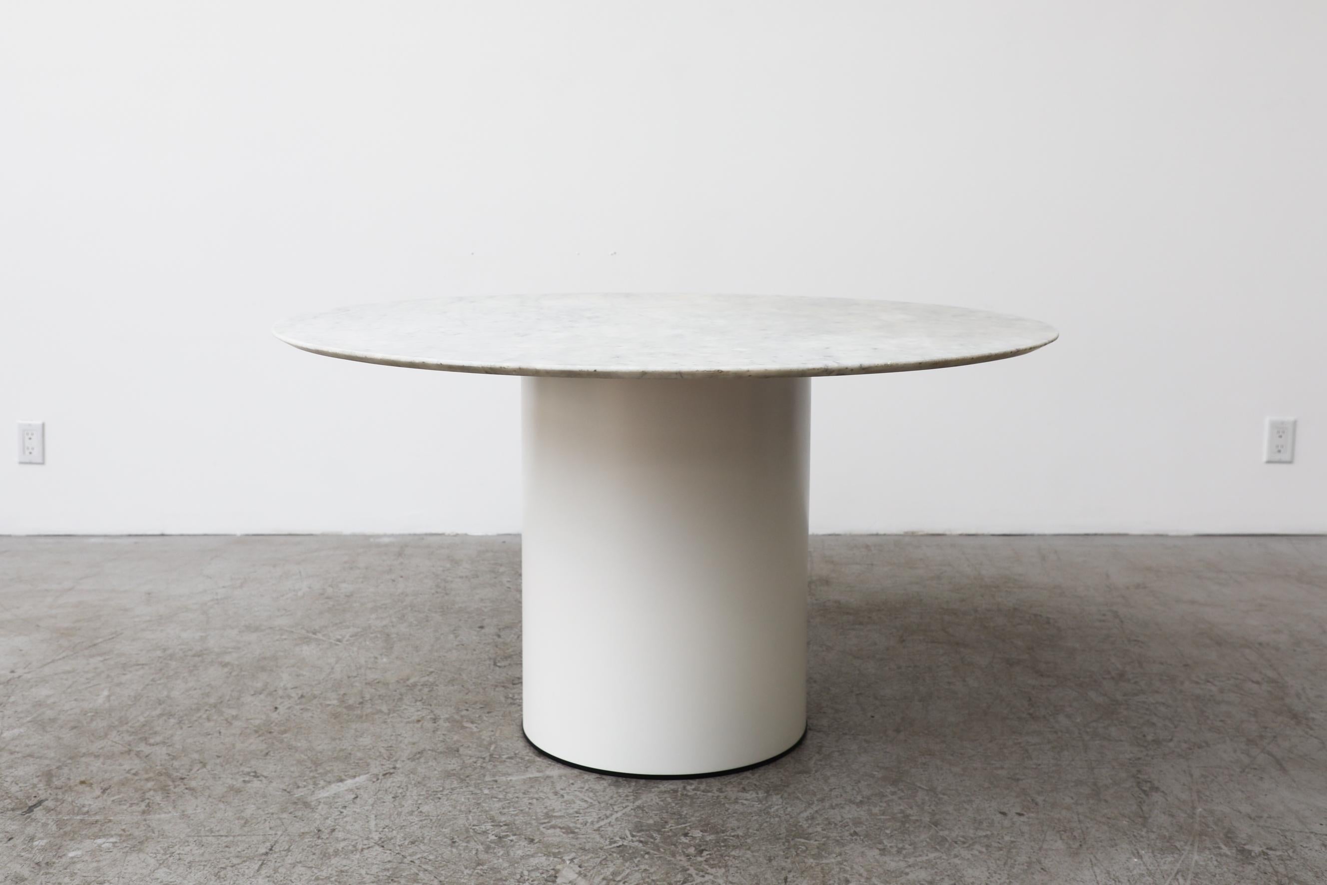 Vintage, Mid century marble pedestal table by Metaform. Top is solid marble and base is a white enameled metal. Can be used as a center table or dining table. The table is in original condition with visible wear, including some discoloration and