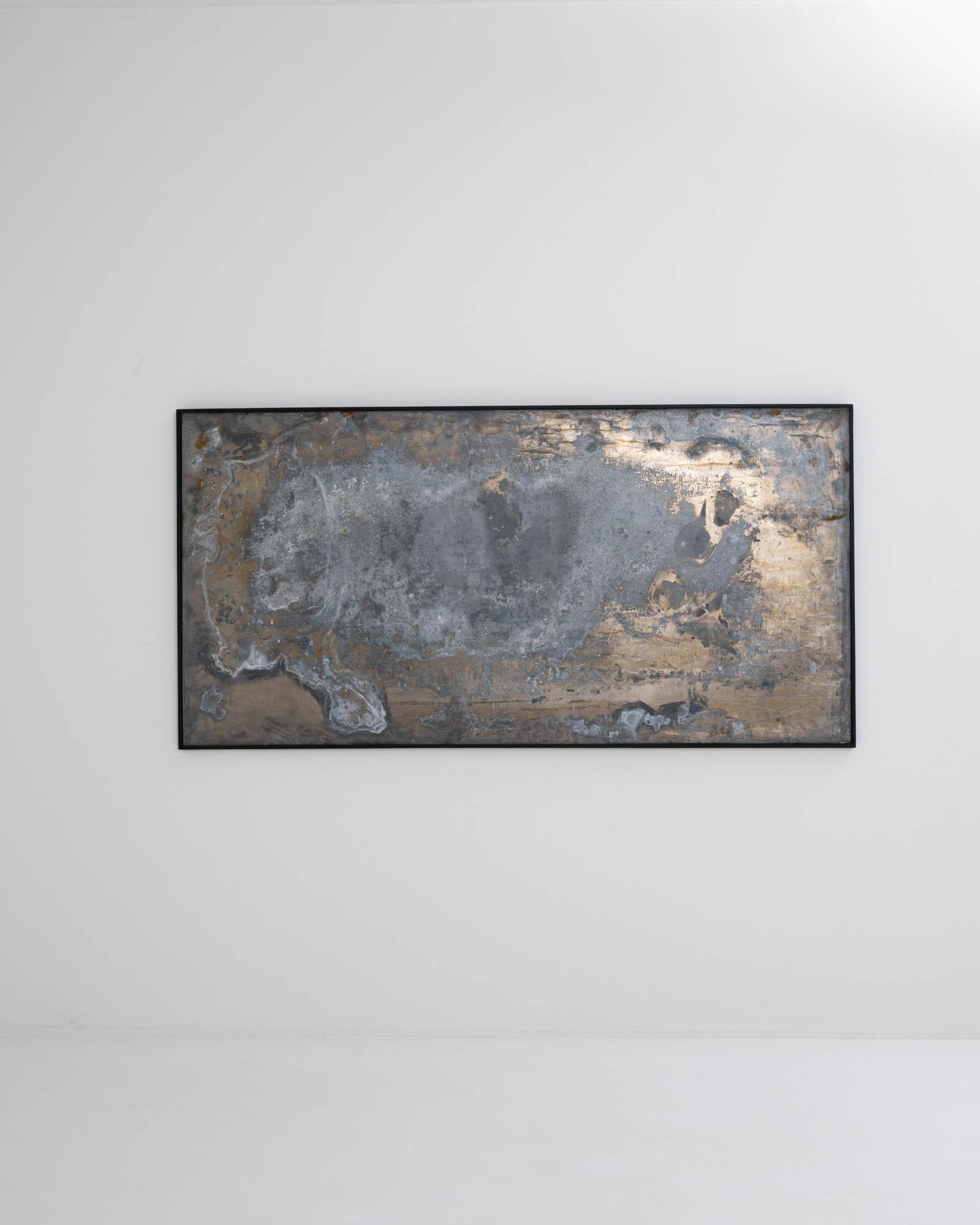 Muscular and enigmatic, this large-scale abstract artwork combines the hand of man and the hand of nature. The form has a minimalist simplicity: a broad sheet of metal is set within a wooden frame. The surface of the metal combines human