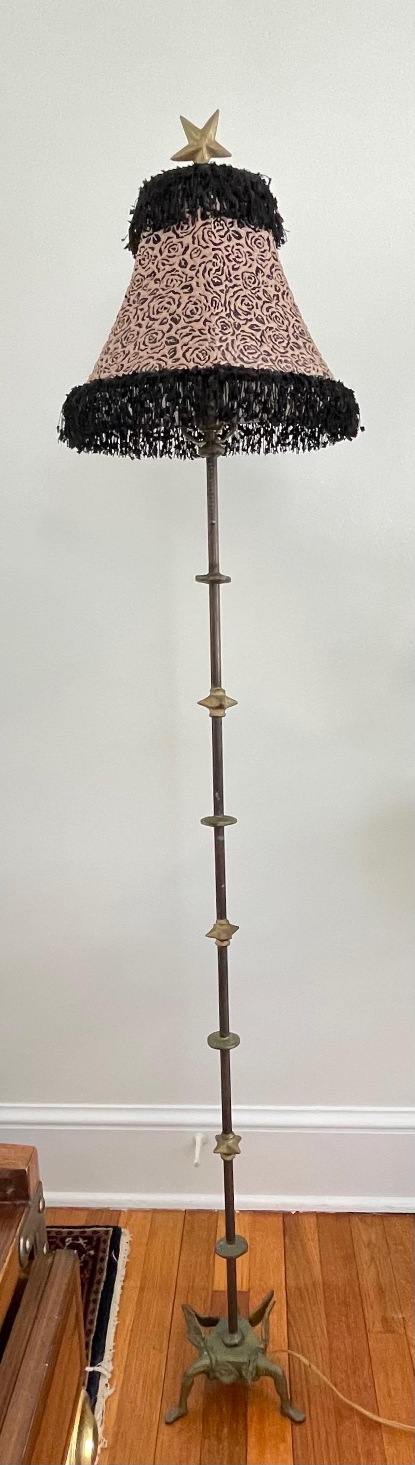 Metal floor lamp with bronze stars and moon or Etoile and lune motif. Slender lamp with alternating design jutting outward. Unique tripod base comprised of bronze winged legs. Giacometti styling.
Curbside to NYC/Philly $300