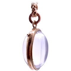 Metal and Glass Pools of Light Locket Pendant, circa 1900