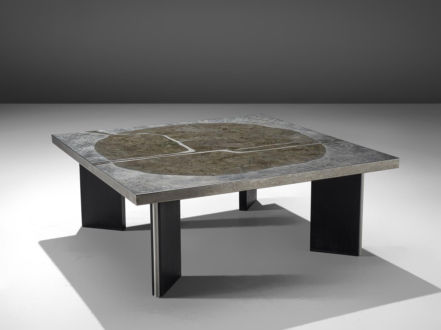 Coffee table, stainless steel, aluminium, wood, Europe, 1970.

This coffee table is made in the postmodern period in Europe. It bears strong resemblances to the style of Heinz Lilienthal and De Sede. The table is made of metal and aluminium