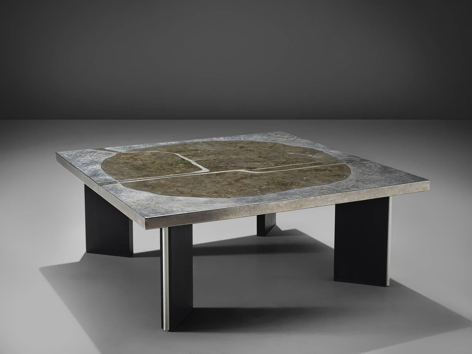 Coffee table, stainless steel, aluminium, wood, Europe, 1970.

This coffee table is made in the postmodern period in Europe. It bears strong resemblances to the style of Heinz Lilienthal and De Sede. The table is made of metal and aluminium