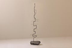 Metal and stone Zigzag sculpture, created in France during the 1960s.