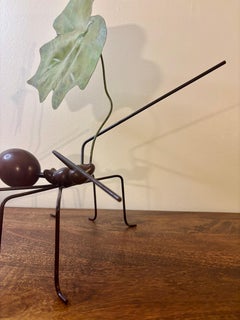 Metal Ant Sculpture Carrying Leaf by Gerardo Fernandez
