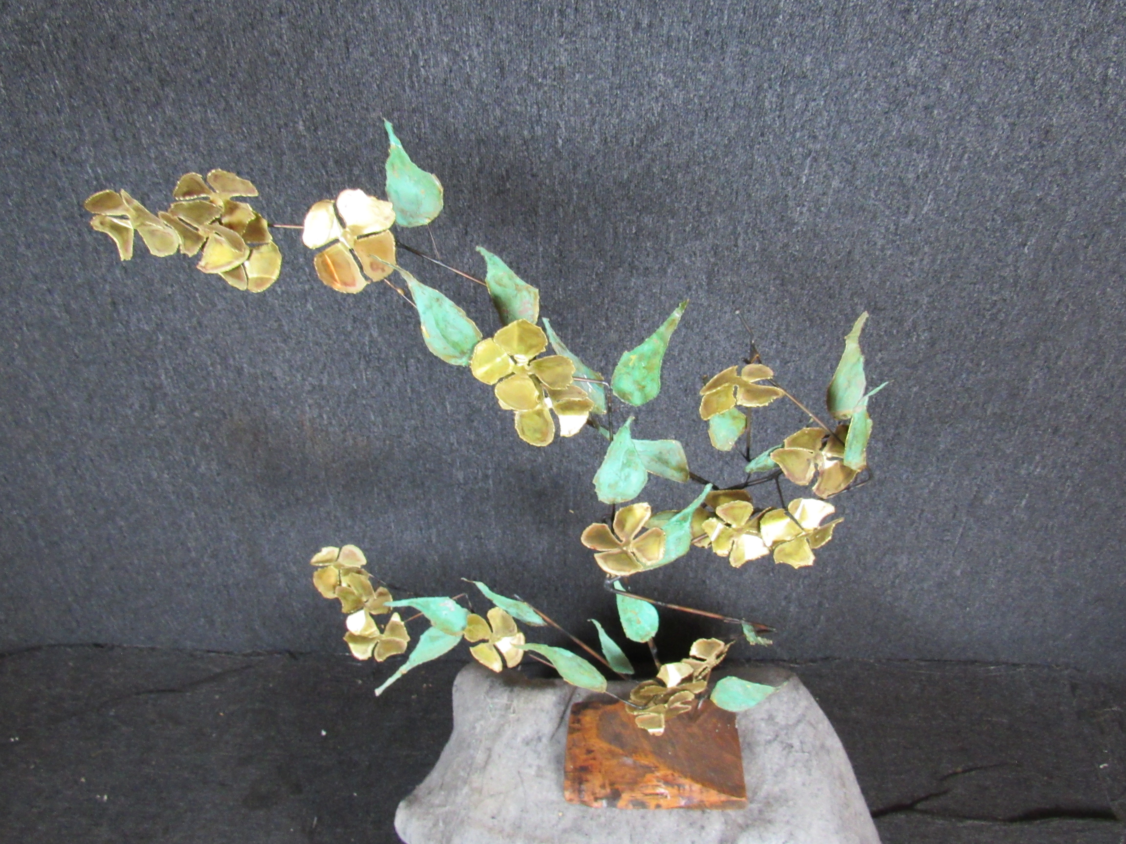 Finally, a house plant that doesn't need watering! This attractive enameled copper & brass bonsai tree sculpture, in the style of Curtis Jeré, is sure to impress. A perfect accent for any room in the home, office, or even somewhere else. Please