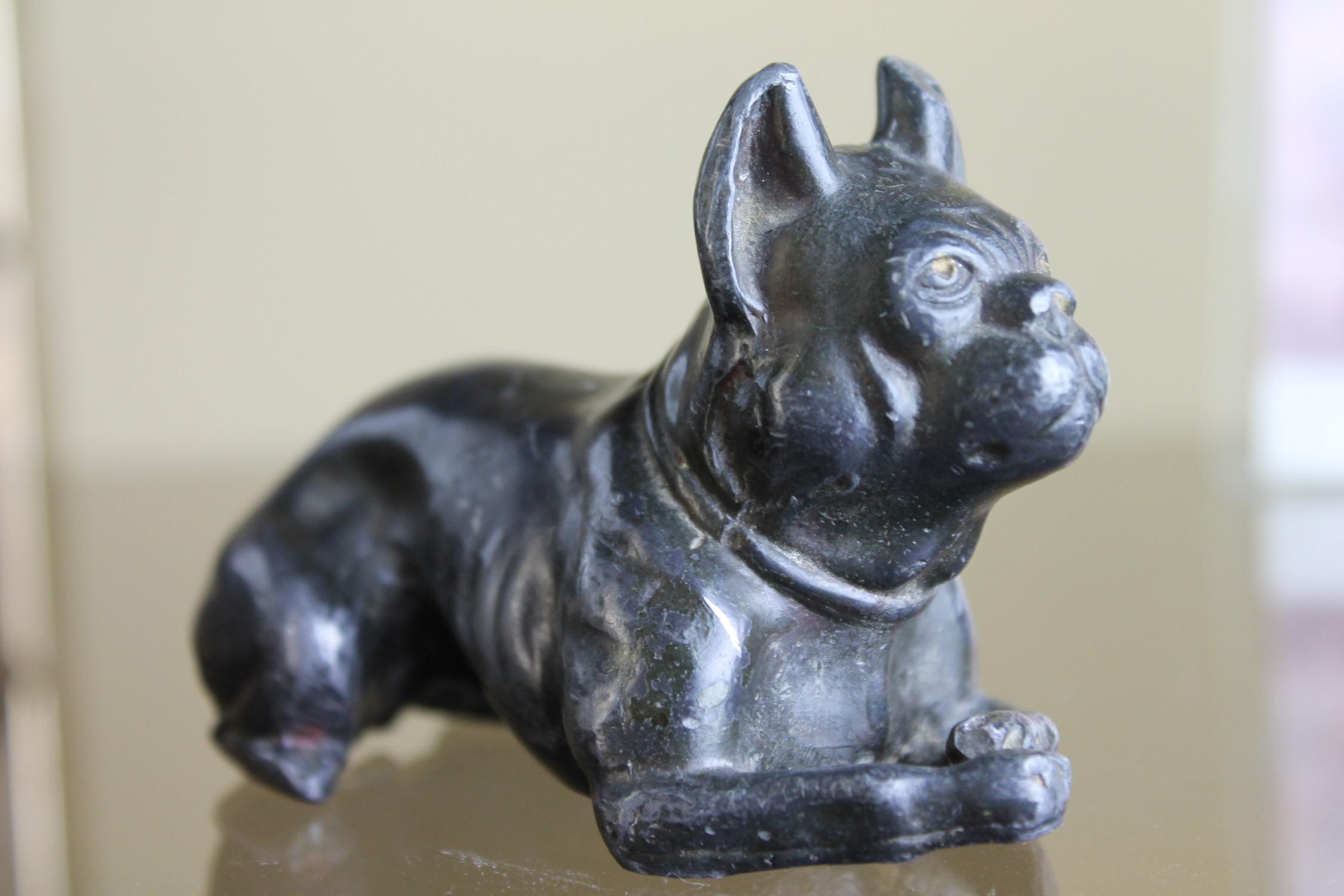 Antique metal French bulldog figurine in the style of Tiffanys Studio.
This heavy metal bulldog paperweight, statue
was probably mounted on a base or used as on ornament; see the chest of the dog.
Early 20th century, Art Nouveau, Art Deco
Dog