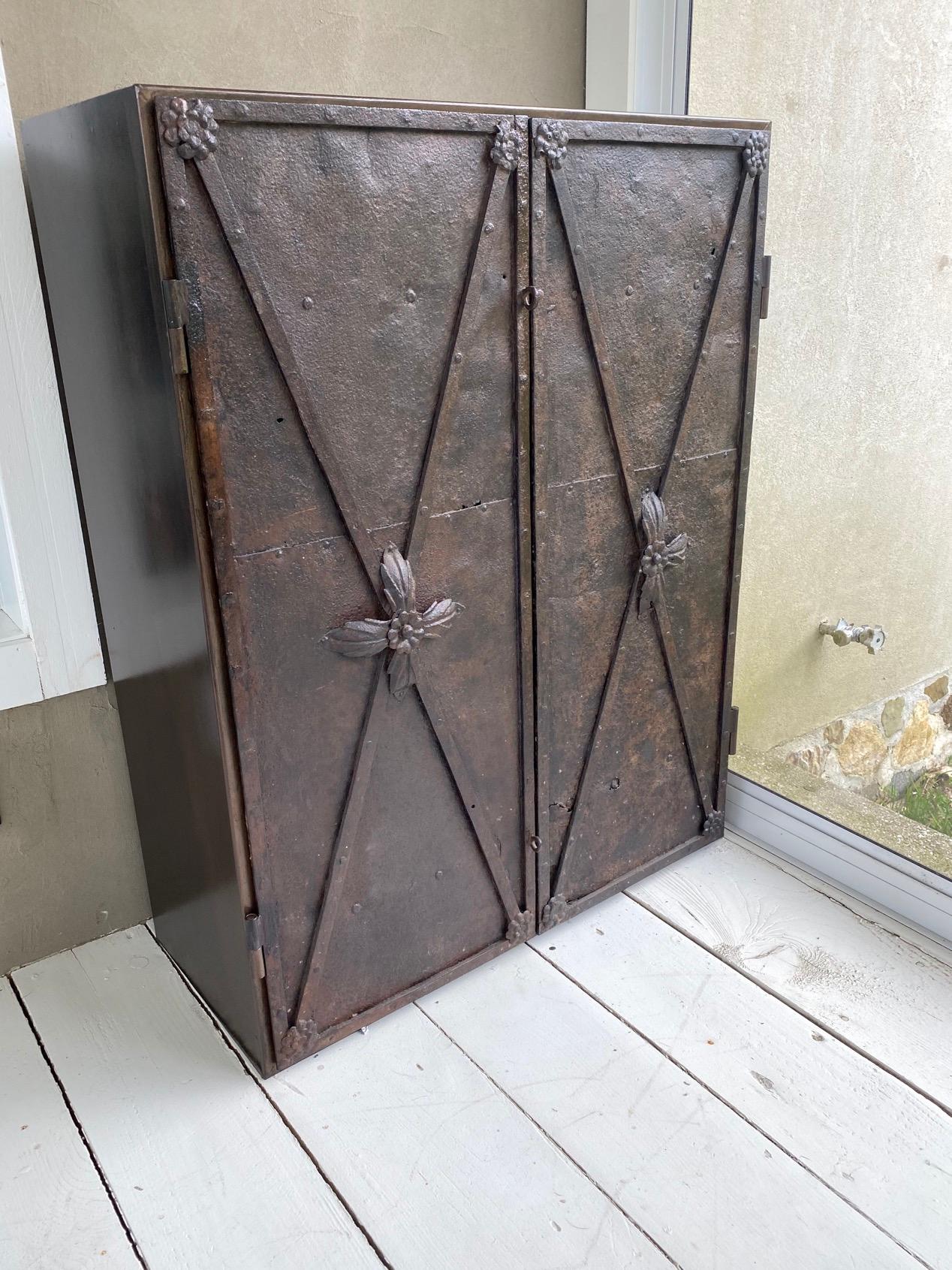 These Directoire period metal doors were once window shutters on an 18th century French chateau that now have been repurposed and made into doors for this cabinet which can lend itself to many uses such as a bar or storage cabinet.
The doors are