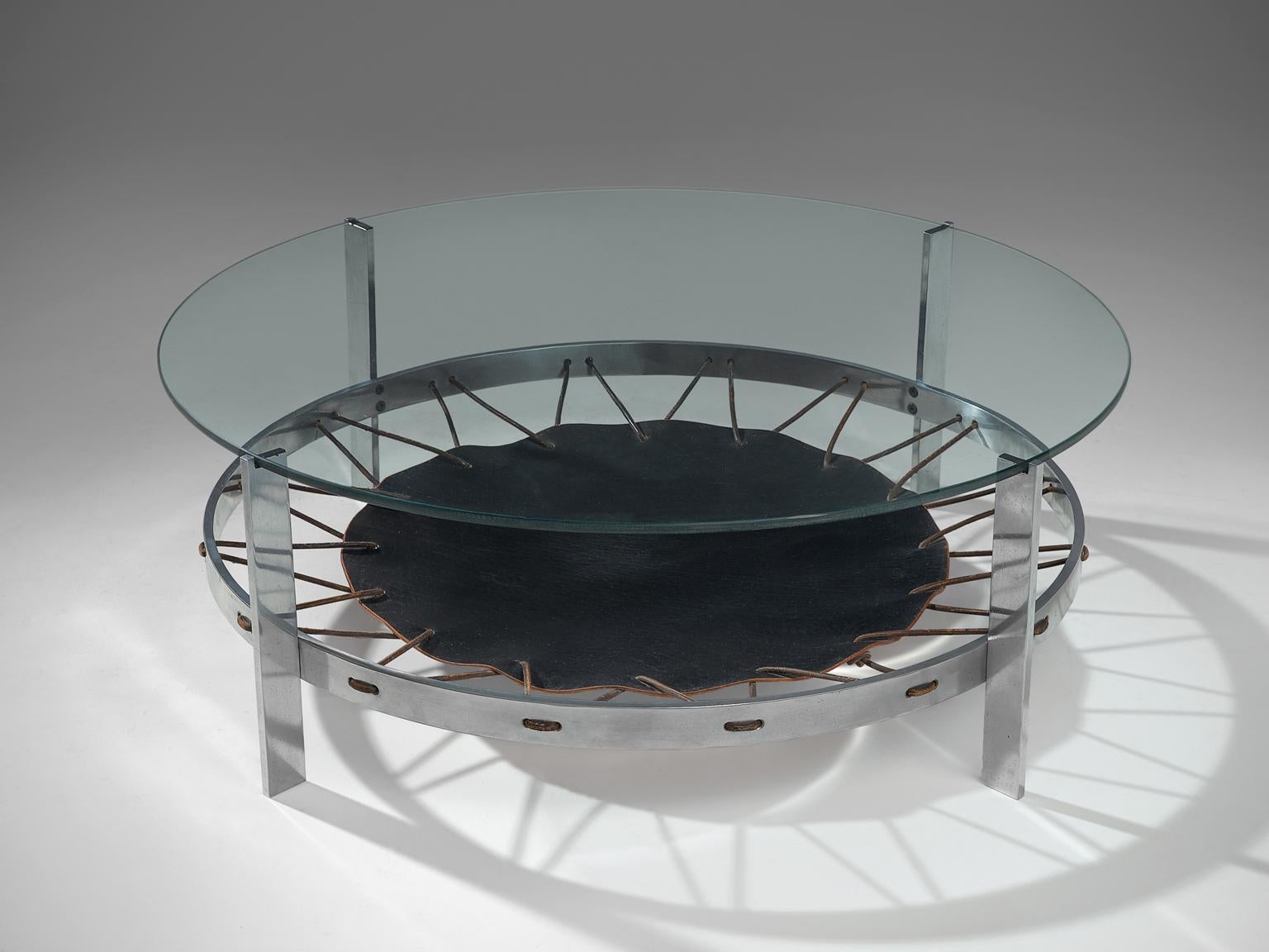 Coffee table, leather, glass and steel, Denmark, 1970s

Well designed coffee table with a superb combination of materials. The chrome and glass are very strand materials on itself, but in combination with the raw leather magazine which is spanned