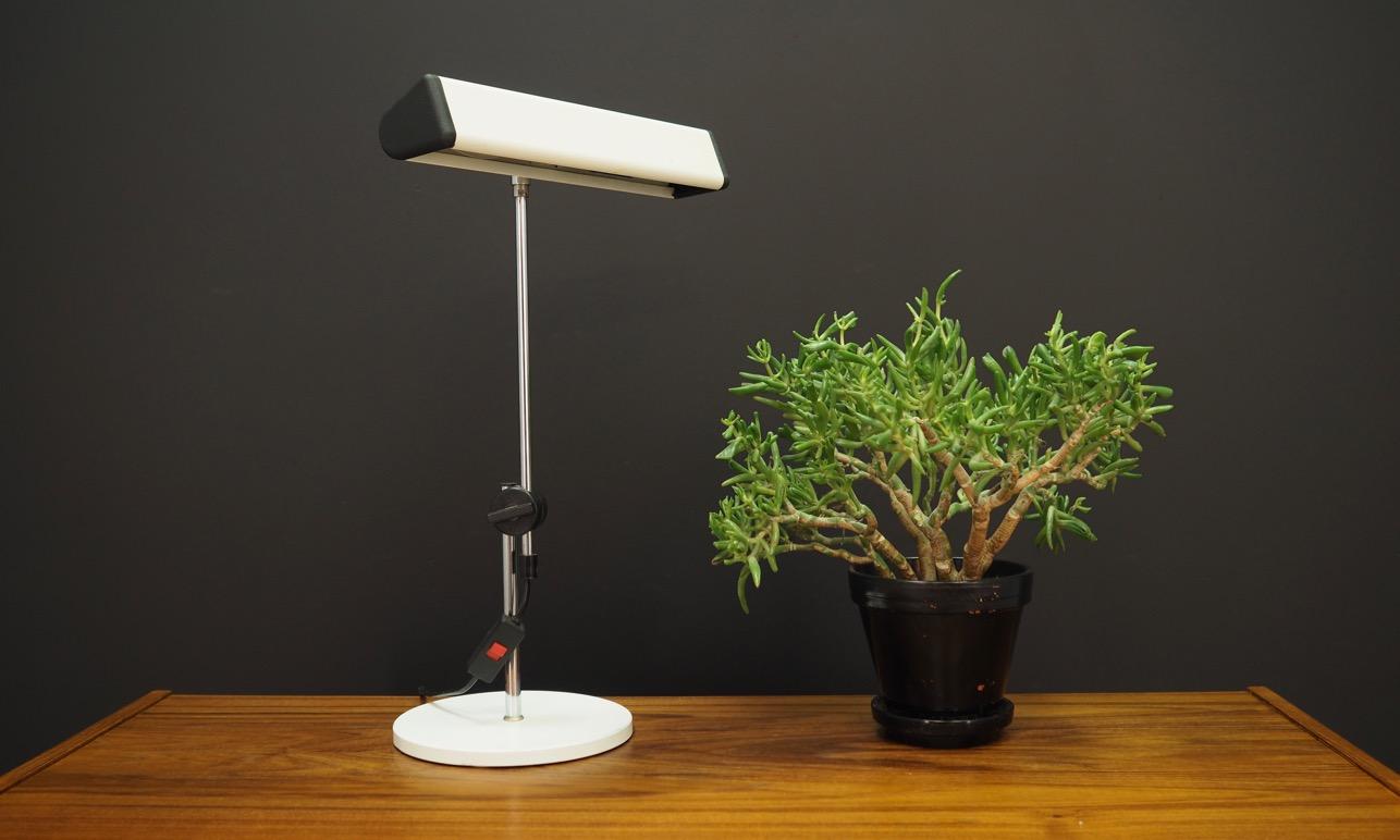 Fantastic desk lamp from the 1960s-1970s. Scandinavian design, Minimalist form. Construction made of metal. Adjustable height and angle of inclination. Maintained in good condition (minor bruises and scratches), directly for use.

Dimensions: