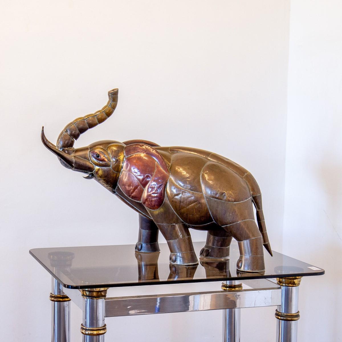 A brass and copper elephant sculpture by Sergio Bustamante, 1970s

Sergio Bustamante is a Mexican Artist and sculptor. The first exhibit of his works was at the Galeria Misracha in Mexico City in 1966. While Bustamante's works initially focused on