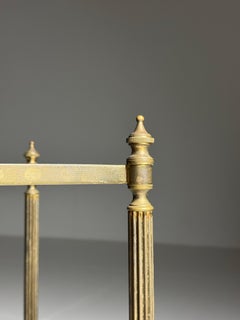 Metal etagère table with smoked glass