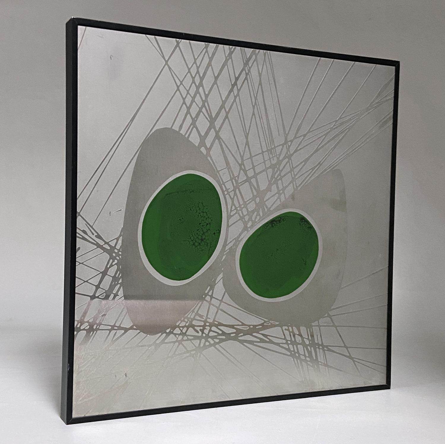 El paiting abstracto grabado con esmalte sobre acero está creado mediante grabado y esmaltado por Manfred Jung,. El artista pinta con ácido directamente sobre el metal pulido, lo que graba un relieve en la superficie. El esmalte en verde vibrante se