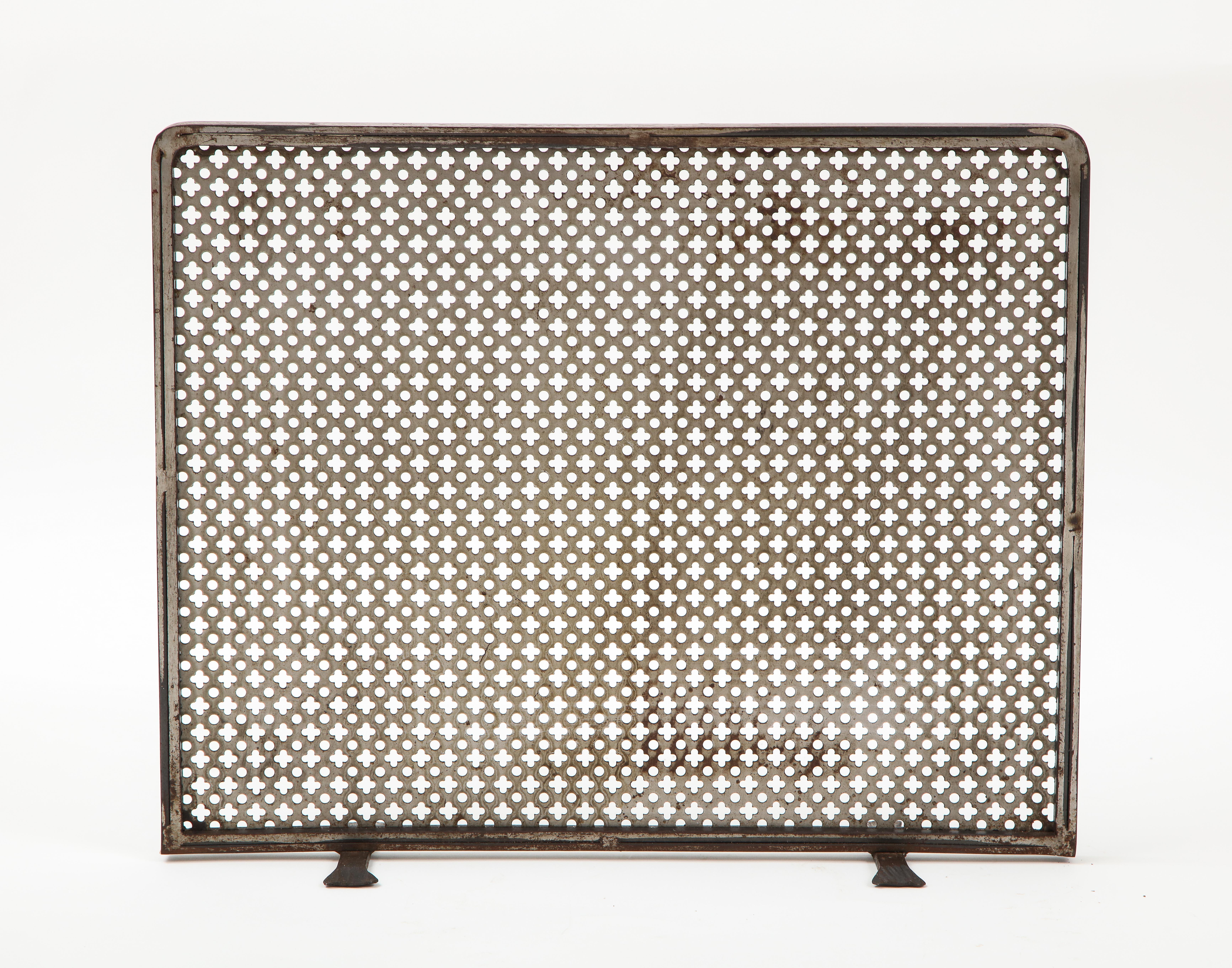 Metal stainless steel fireplace screen in the style of Matthieu Mategot, French, c. 1950
Beautiful patina, (Feet are 5