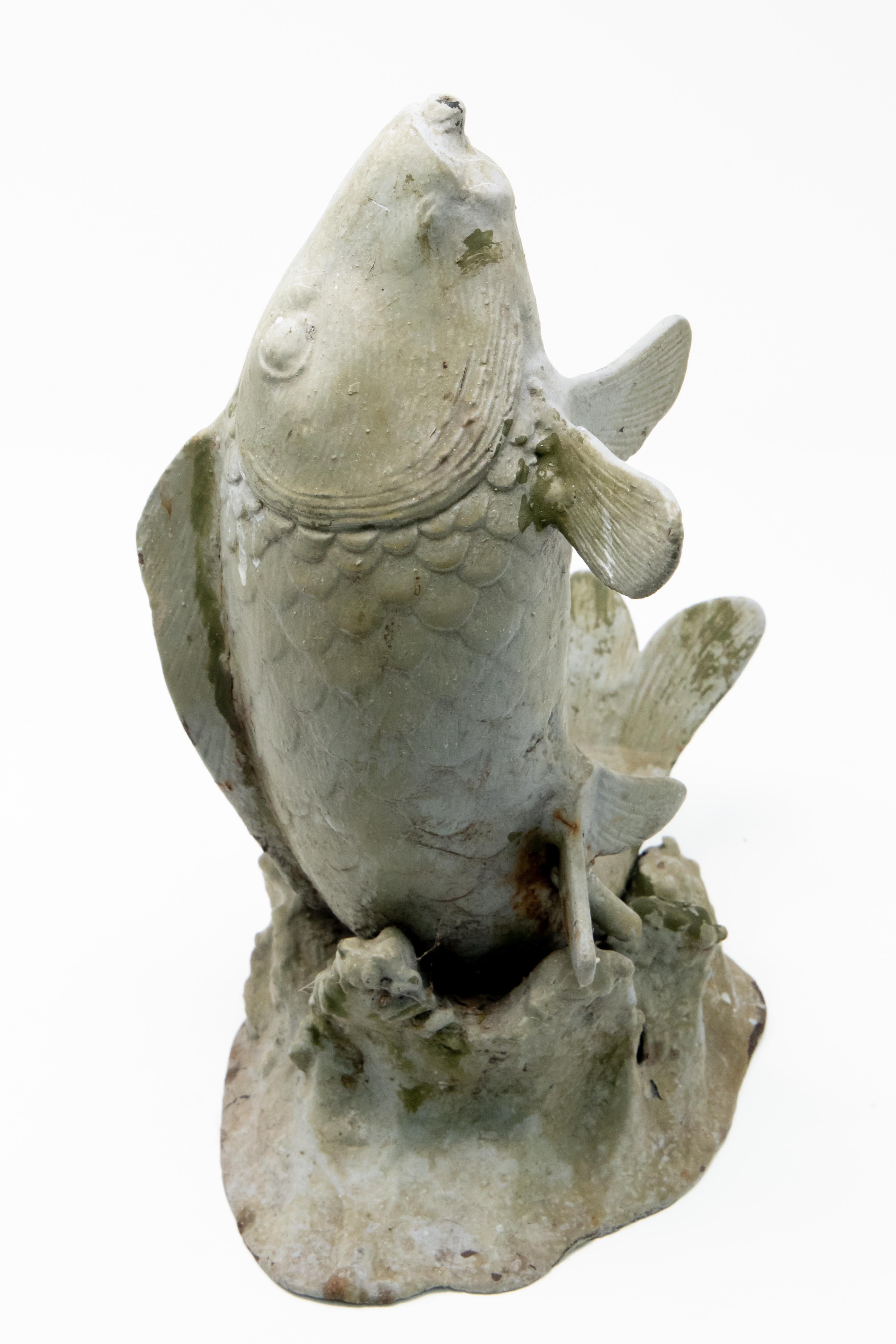 This cast metal fish fountain head will look great in any water element. Hand cast and aged beautifully. Has a spout up the center for water to shoot out of. He is posed to look like he is jumping out of water.