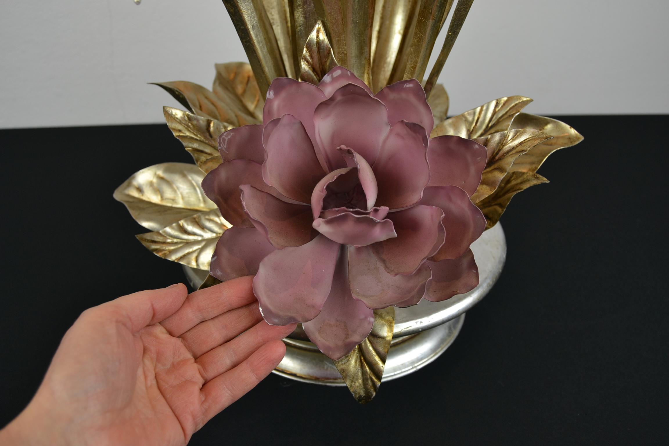 Great looking metal flower table lamp. 
This floral table lamp has metal golden leaves with a large pink metal flower. 
On top a vintage velvet pink lampshade with little traces. 

A stylish table lamp from the 1980s to place in your interior. 
The