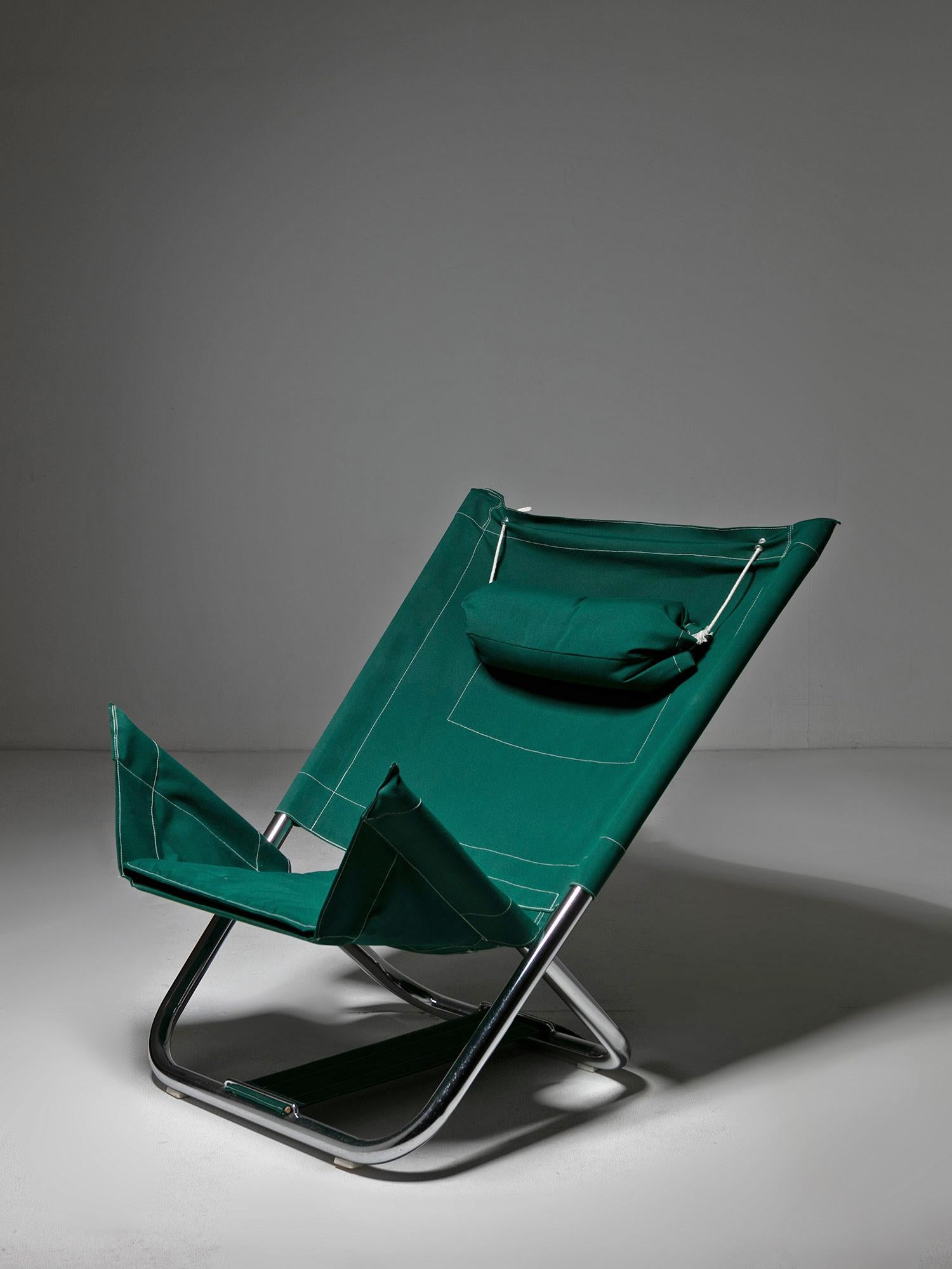 Folding armchair by Roberto Pamio and Renato Toso for Stilwood.
Tubular chrome frame and cozy seat with head-rest and large pocket on the back.