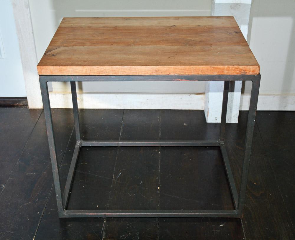 Iron metal frame geometric side or end table with teakwood top. Appropriate for indoor or outdoors use.