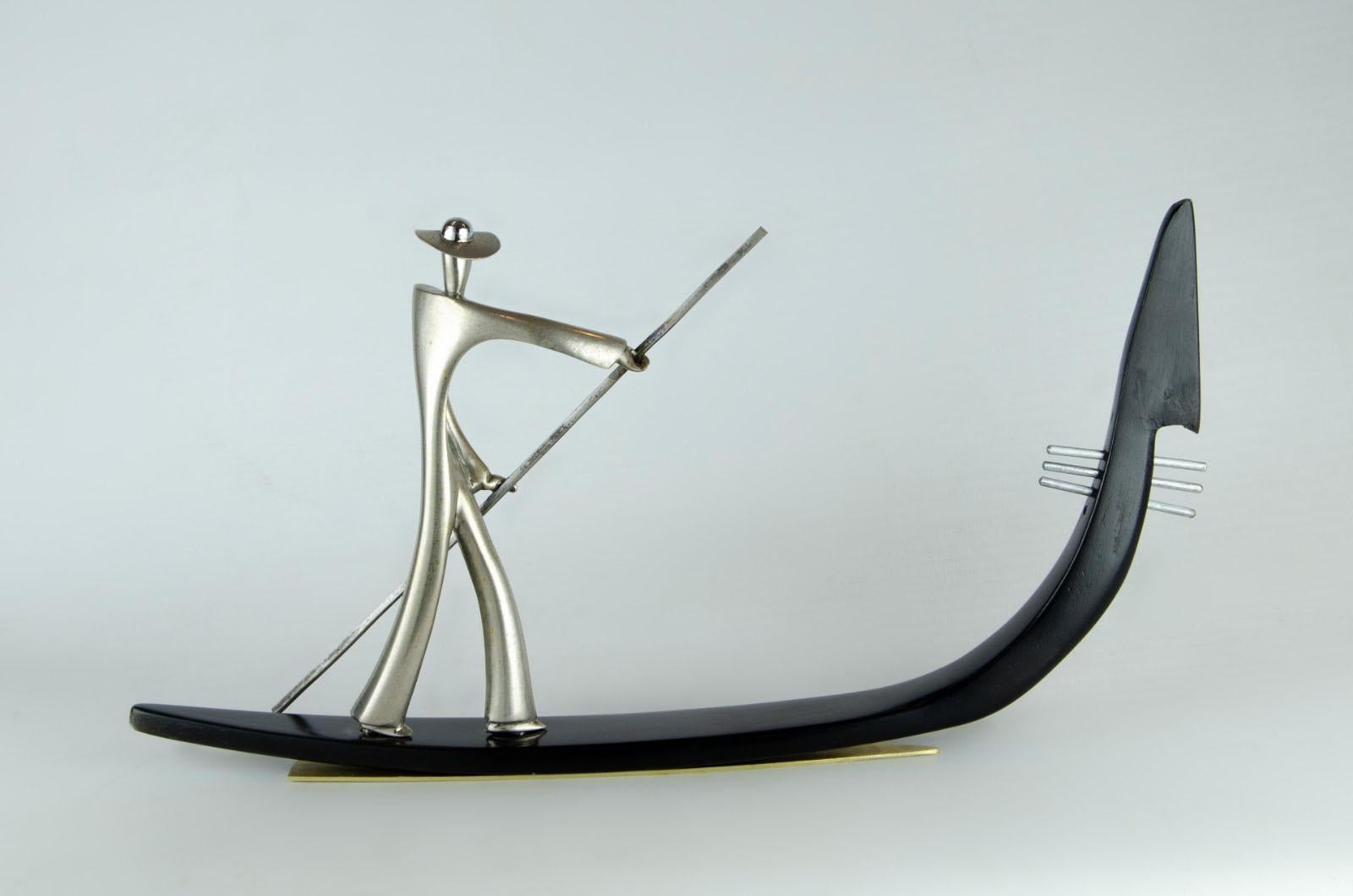 Art Deco Metal gondola sculpture in the Karl Hagenauer style. For Sale