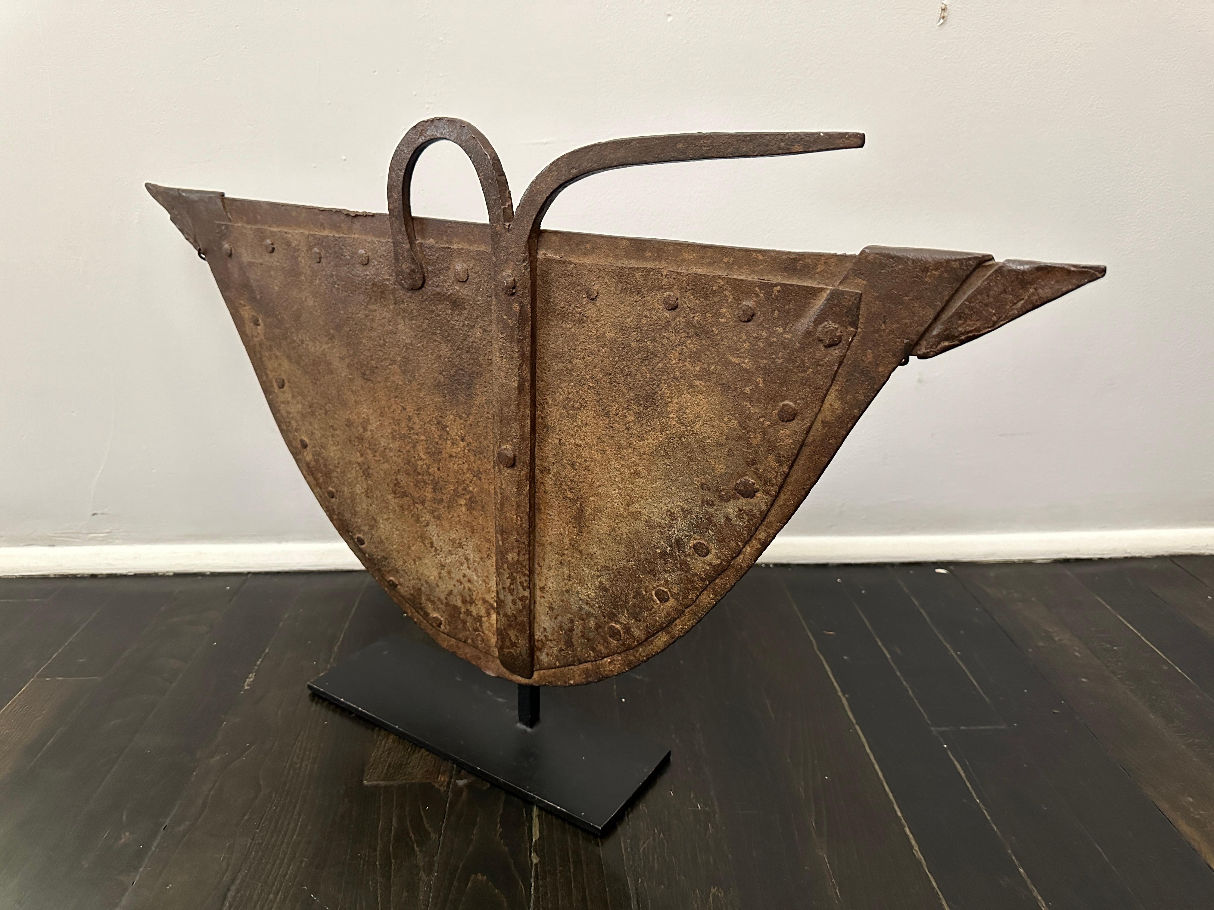 African antique currency from the Congo, most likely Iron. Beatufil decorative piece,  includes a stand.  This Currency piece was circulated as a means of payment across Africa. It was also used for dowry payments in marriage contracts.

Property