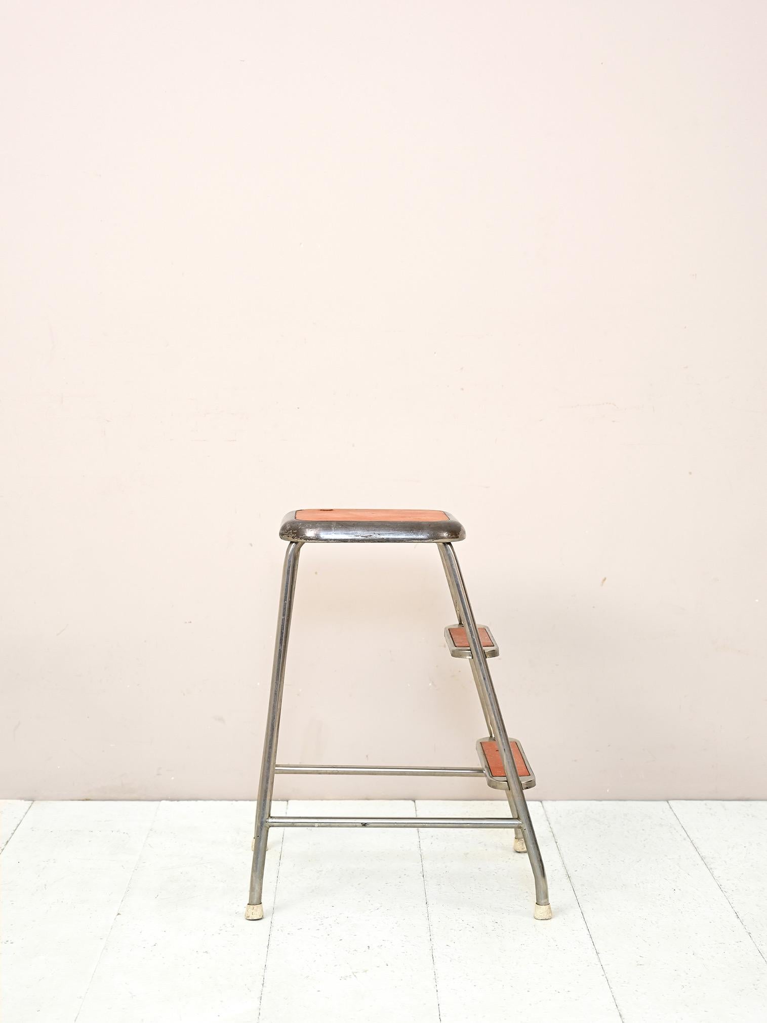 Scandinavian metal ladder.
An original piece found in every home in Sweden. 
Modern and industrial in flavor, it can be used for a variety of purposes, including for resting clothes in the bathroom or as a nightstand in the bedroom.

Good