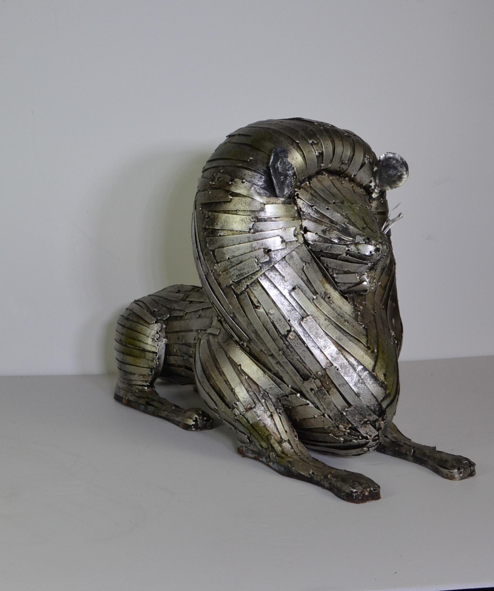 Hand made metal lion sculpture.