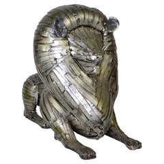 Escultura de león de metal